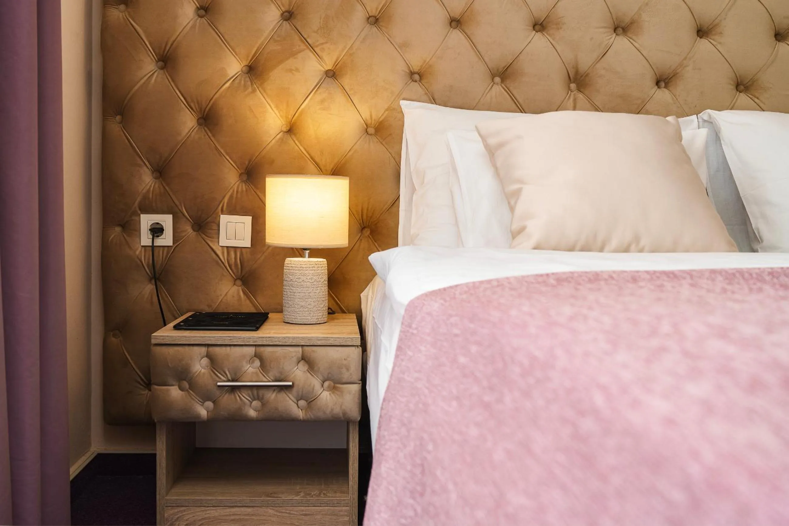 Bed in Hotel Stella Maris - Style & Comfort