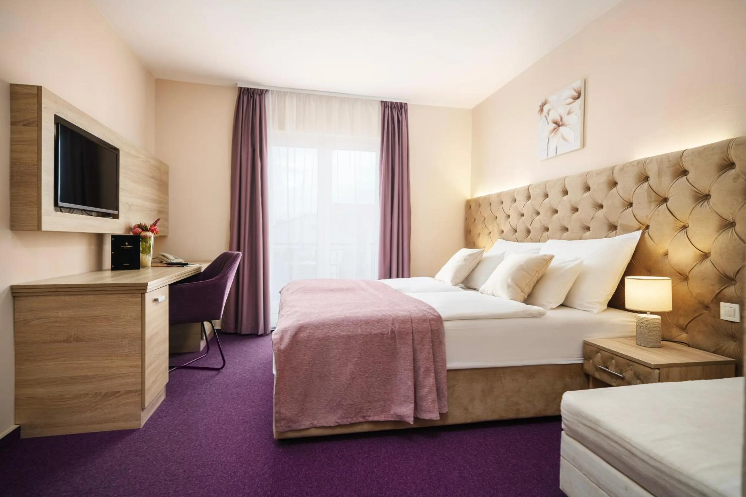 Bed in Hotel Stella Maris - Style & Comfort