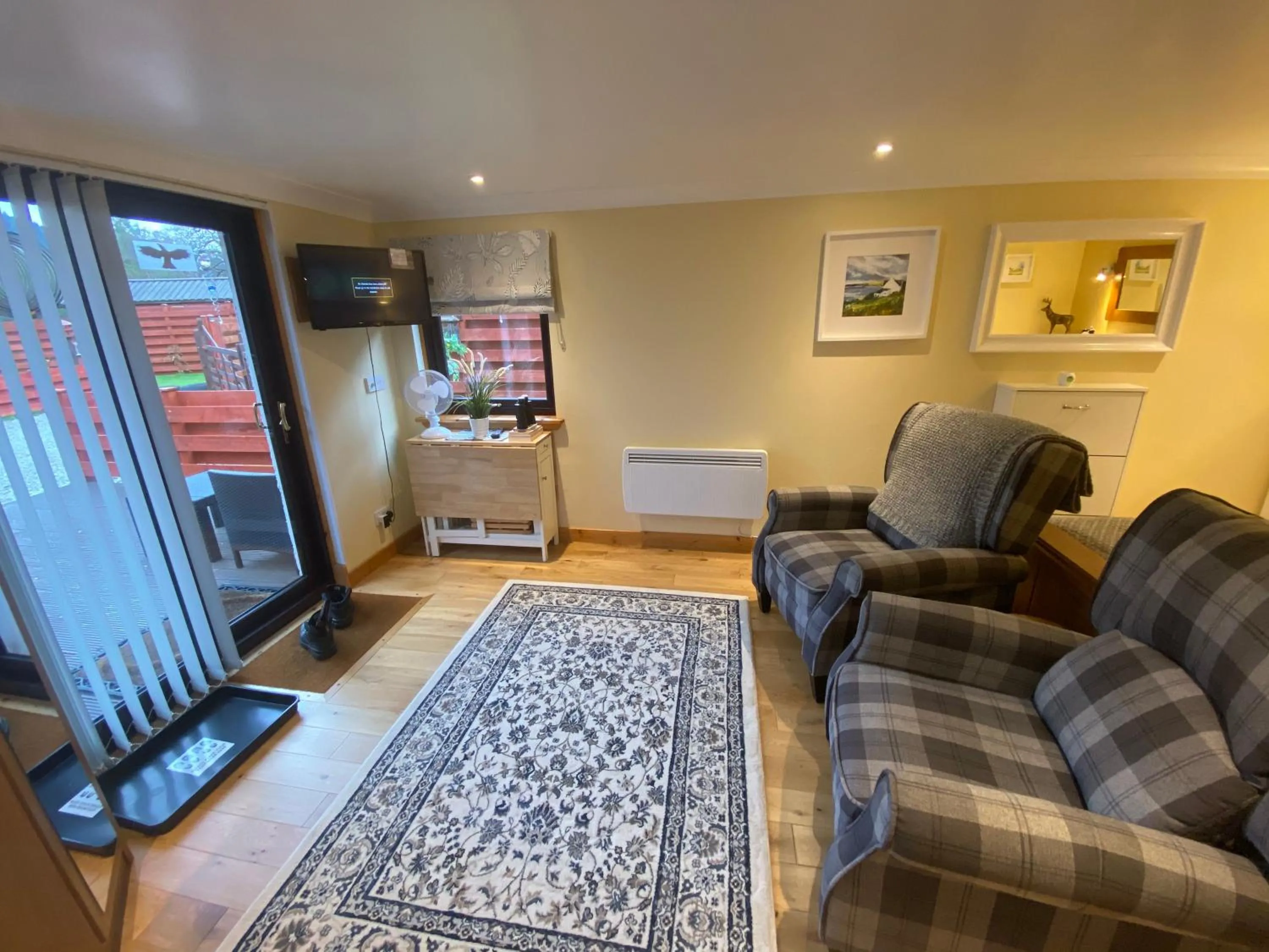 Living room in The Wee Ludging Cottage, Rashfield, by Dunoon