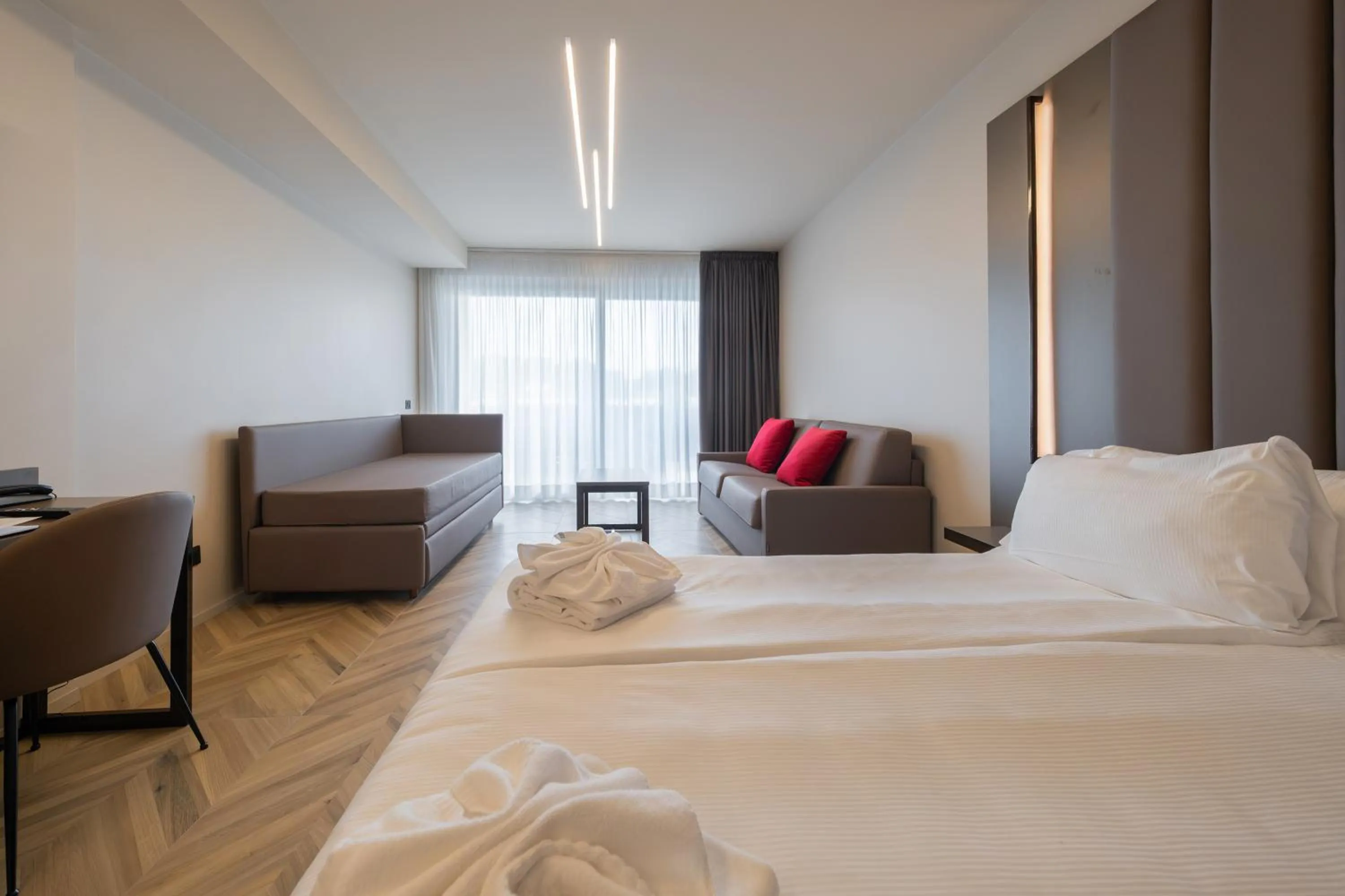 Bed in Aurora ApartHotel