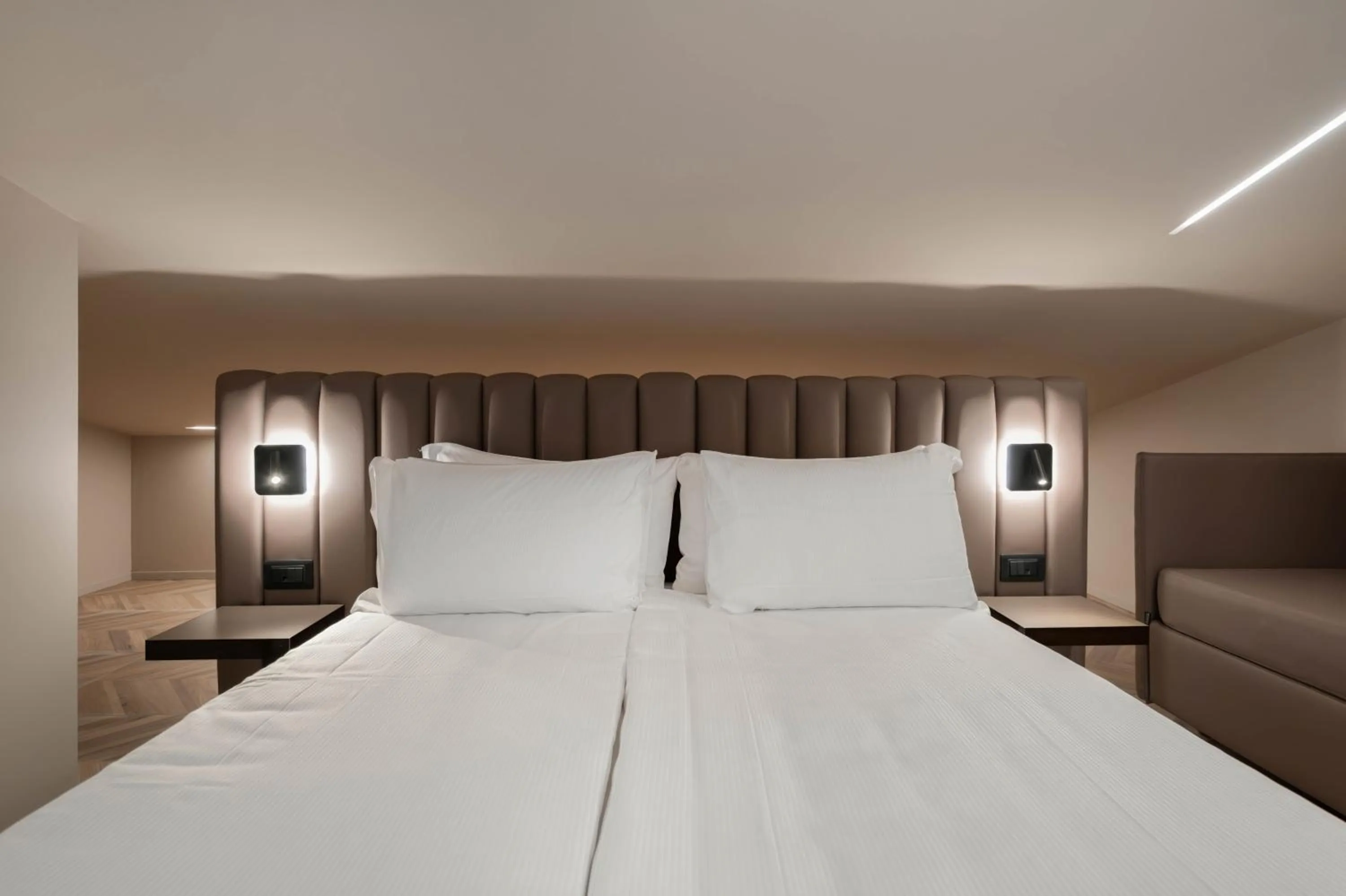 Bed in Aurora ApartHotel