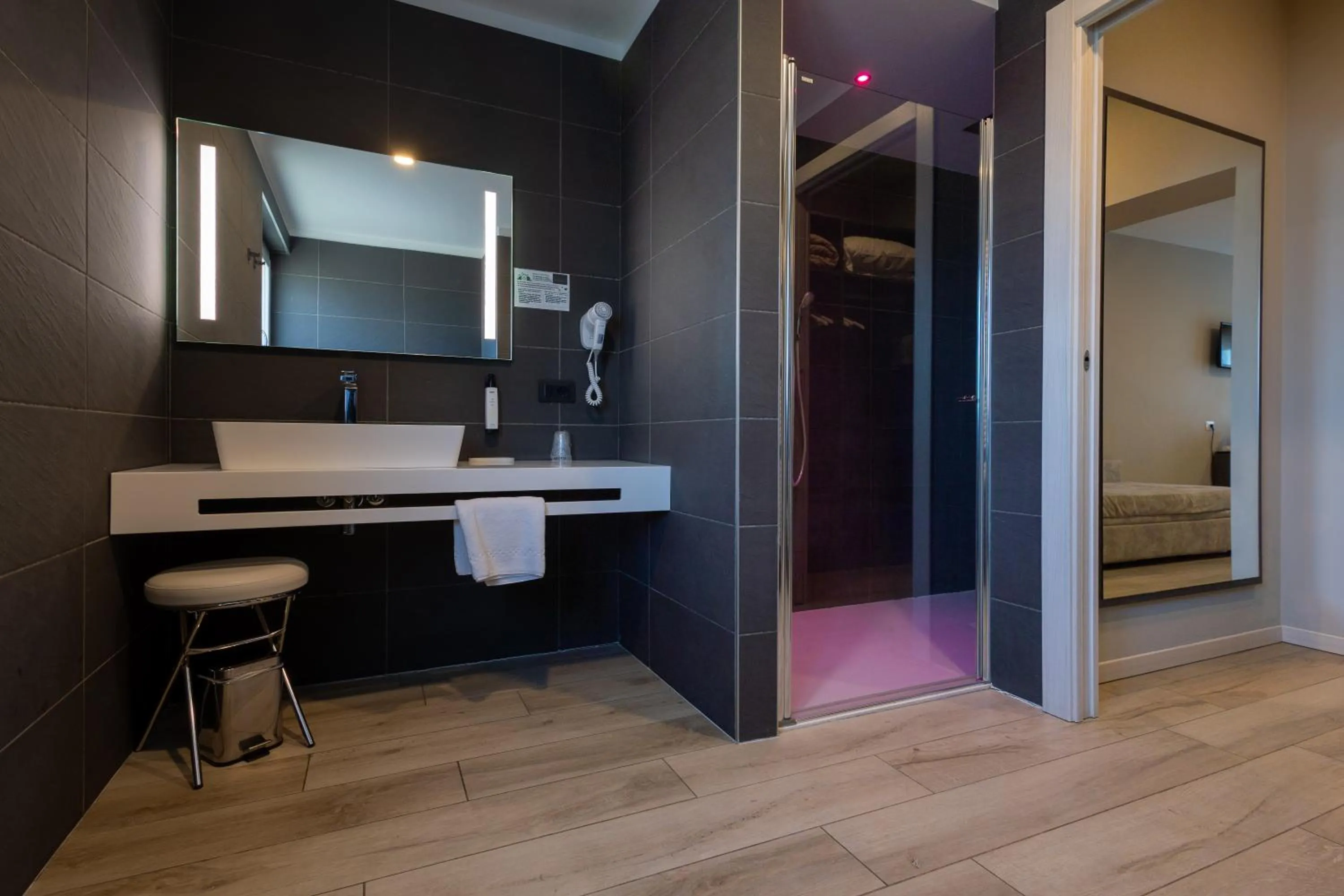 Bathroom in Aurora ApartHotel