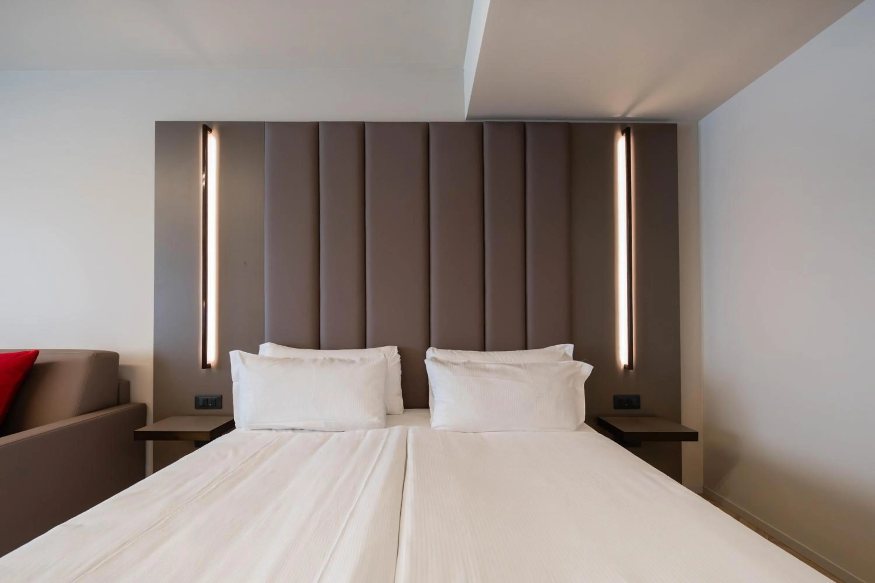 Bed in Aurora ApartHotel