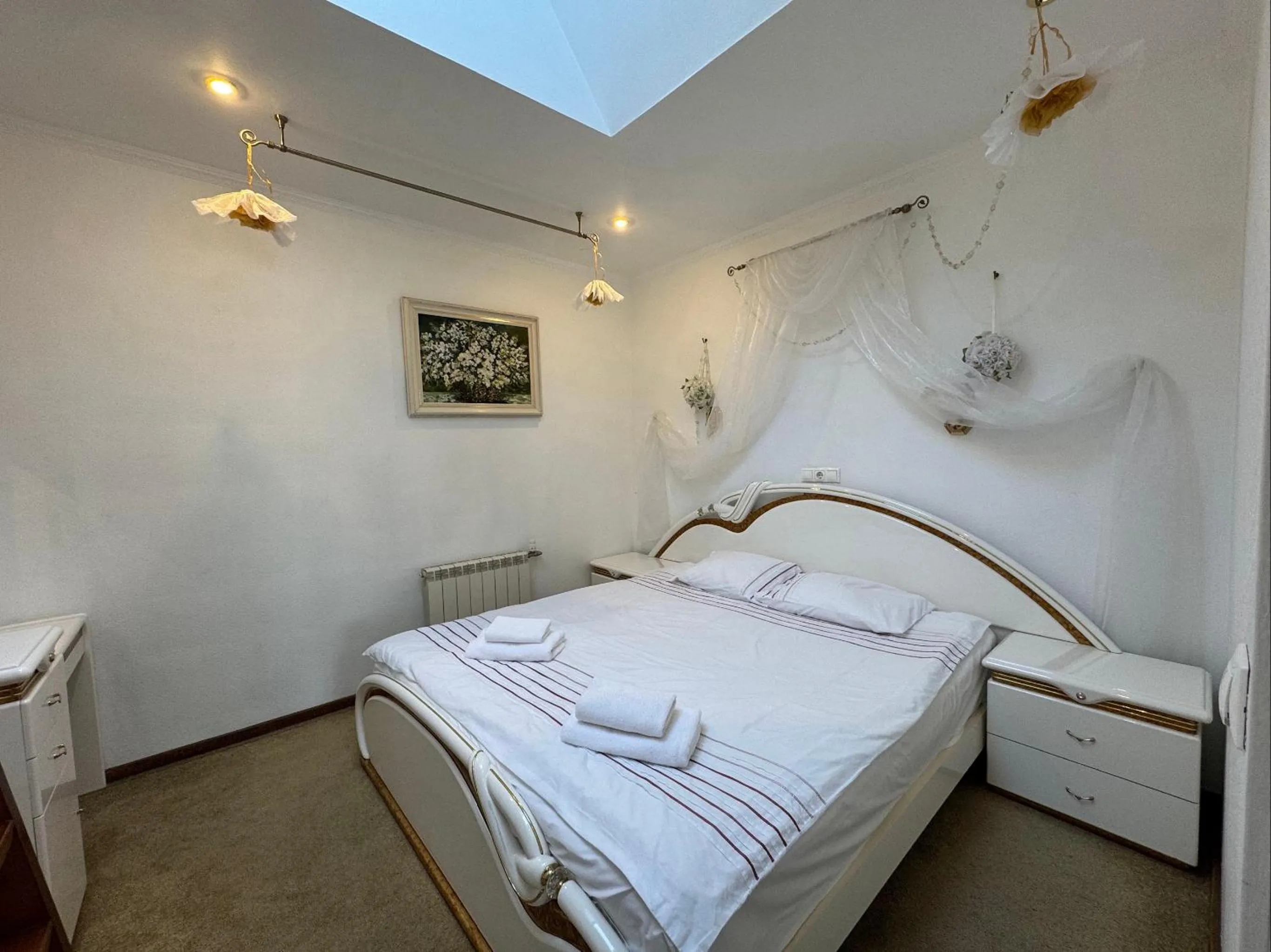 Bed in Gusarskiy Hotel and Apartment