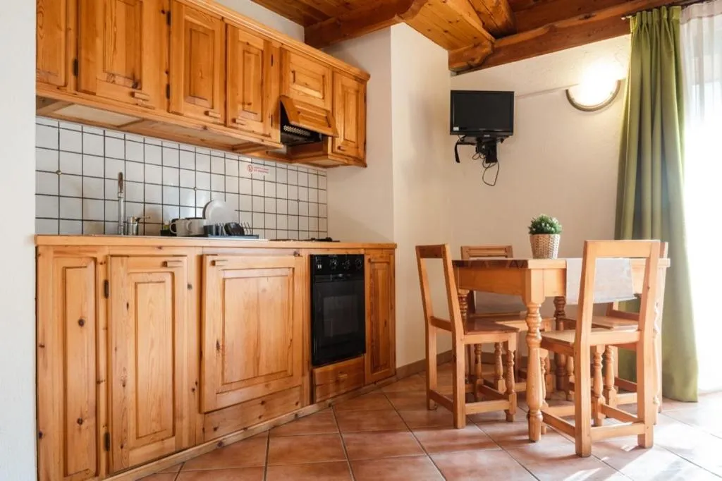 Kitchen or kitchenette in Residence Cascina Genzianella