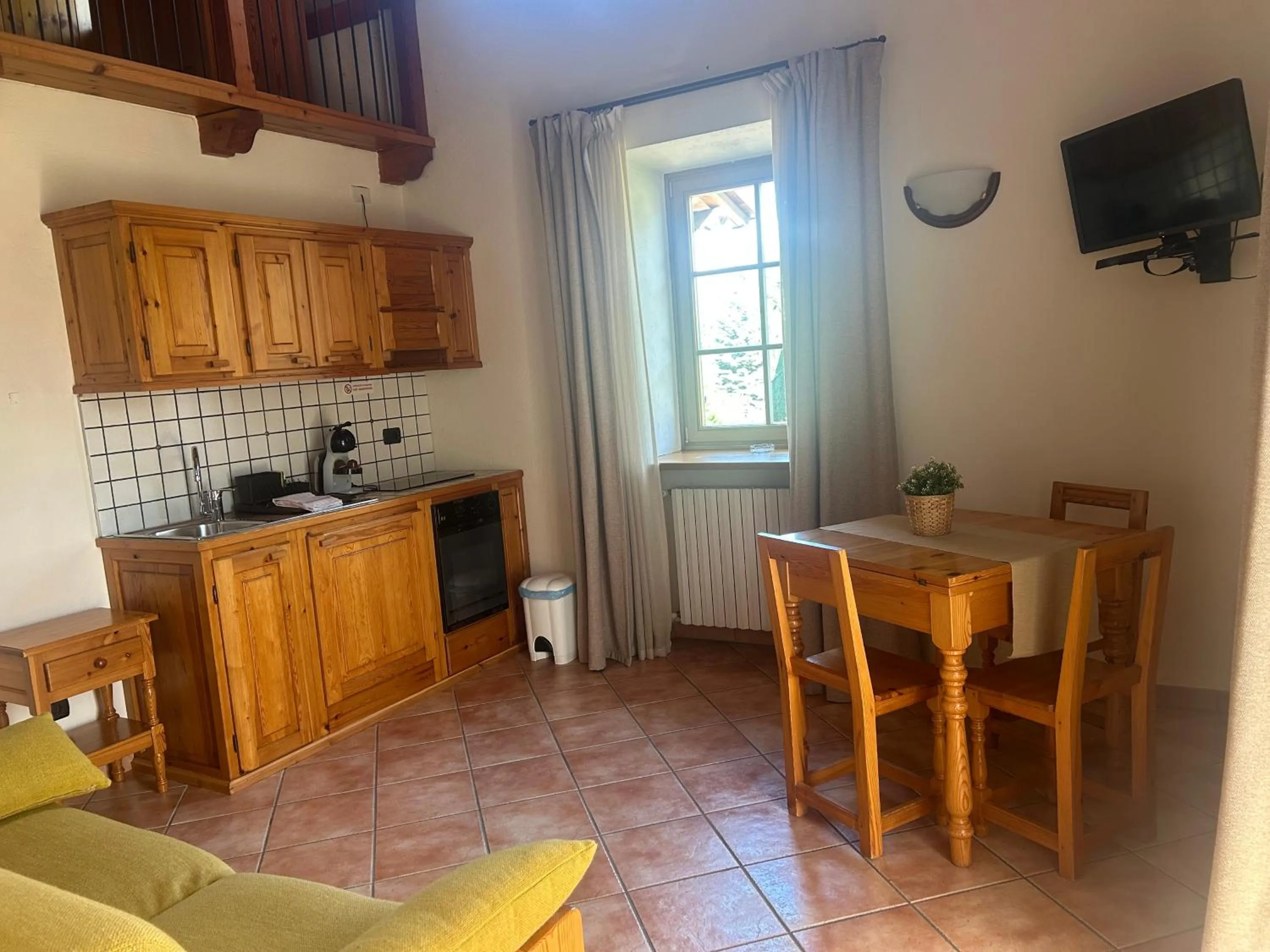 Kitchen or kitchenette in Residence Cascina Genzianella