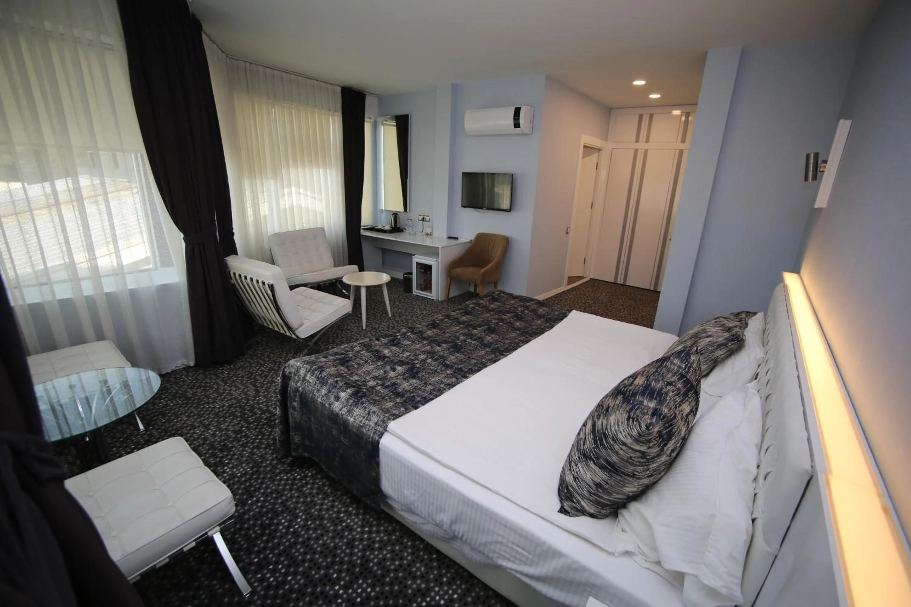 Bed in Grand Nora Hotel