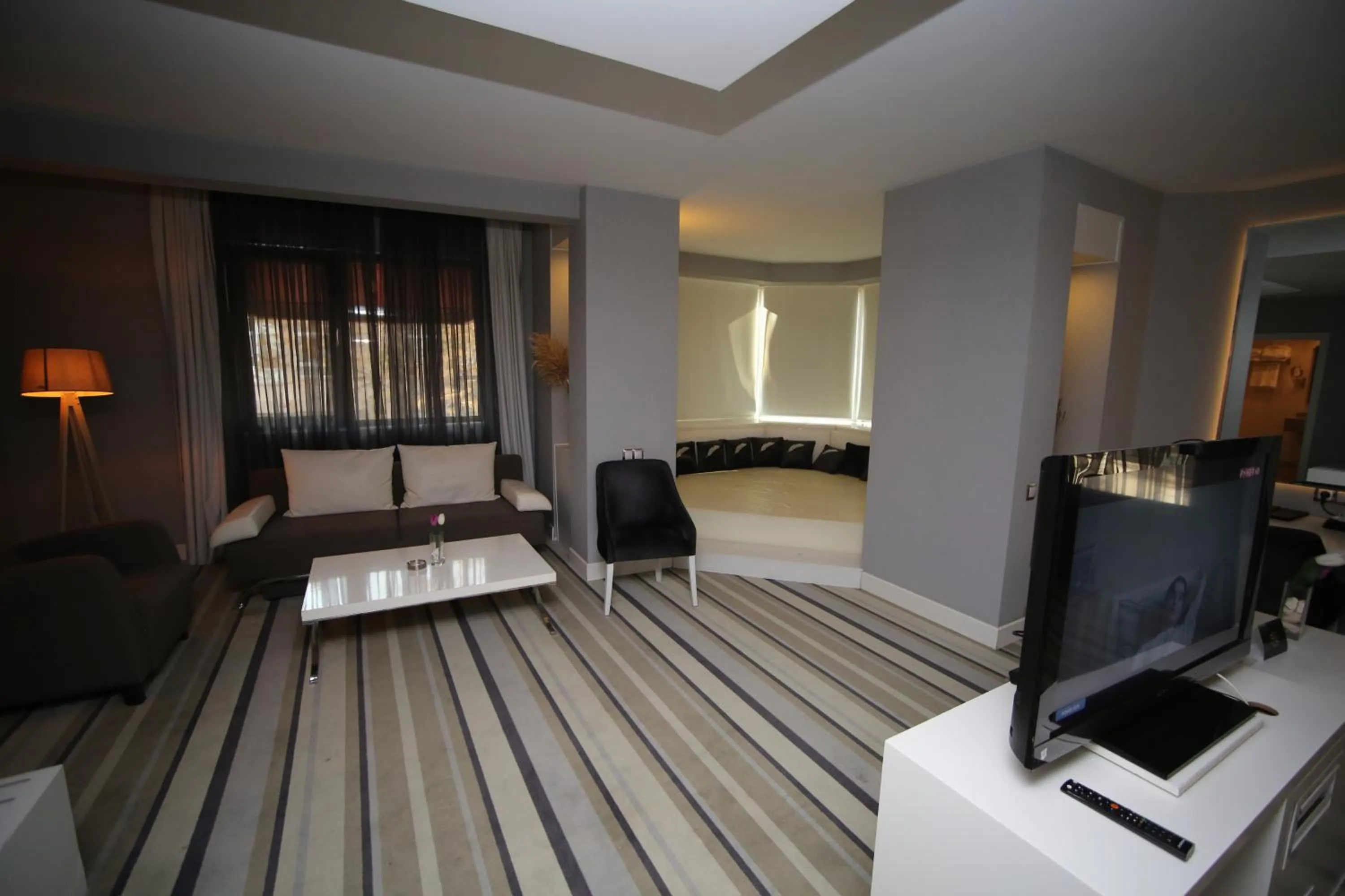 Bed in Grand Nora Hotel