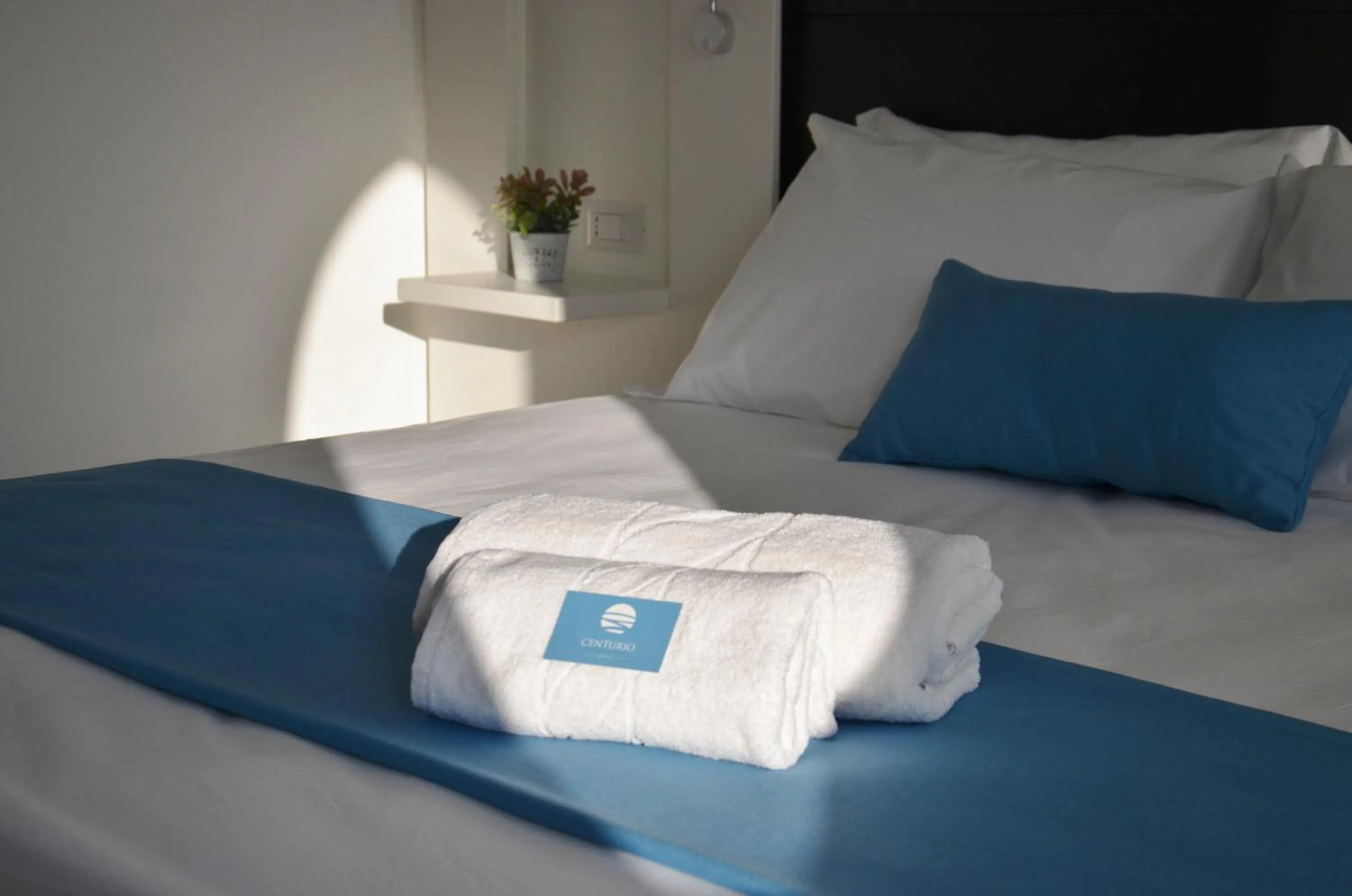 Bed in Centurio luxury rooms