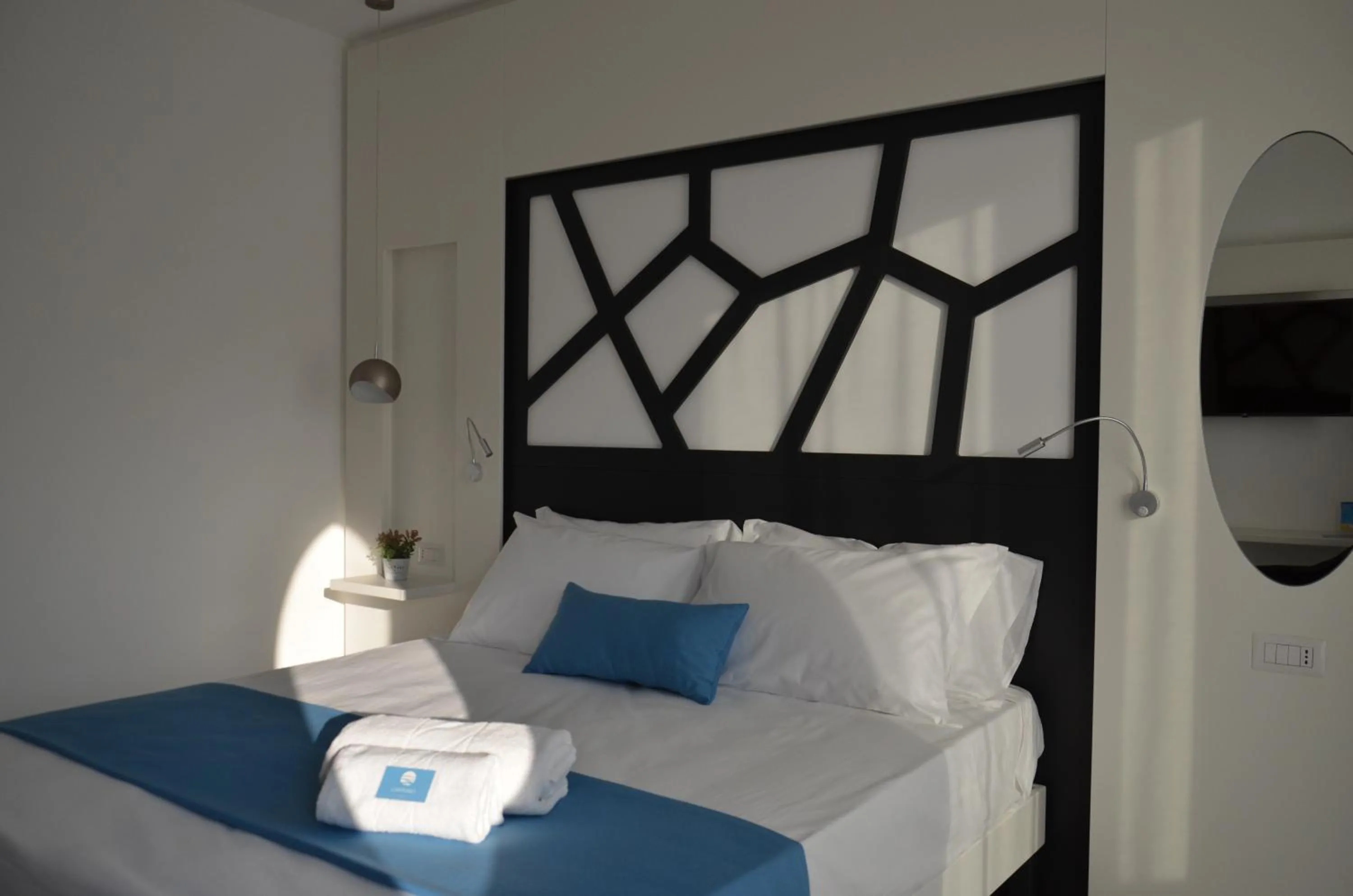 Bed in Centurio luxury rooms