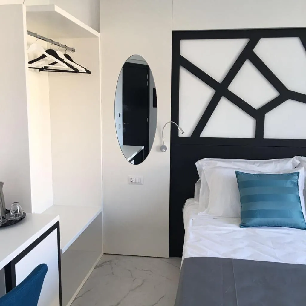 Bed in Centurio luxury rooms