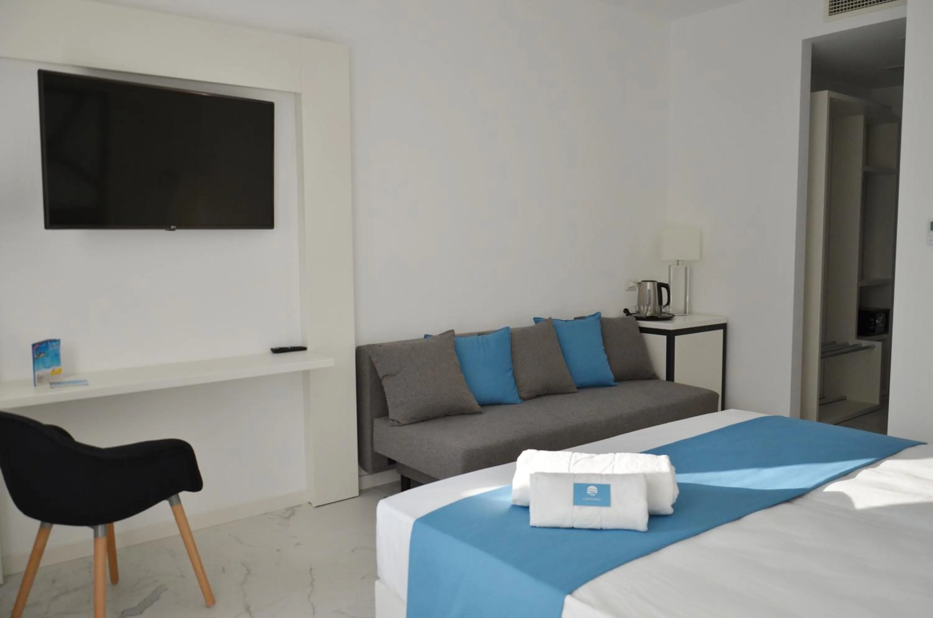 Bed in Centurio luxury rooms
