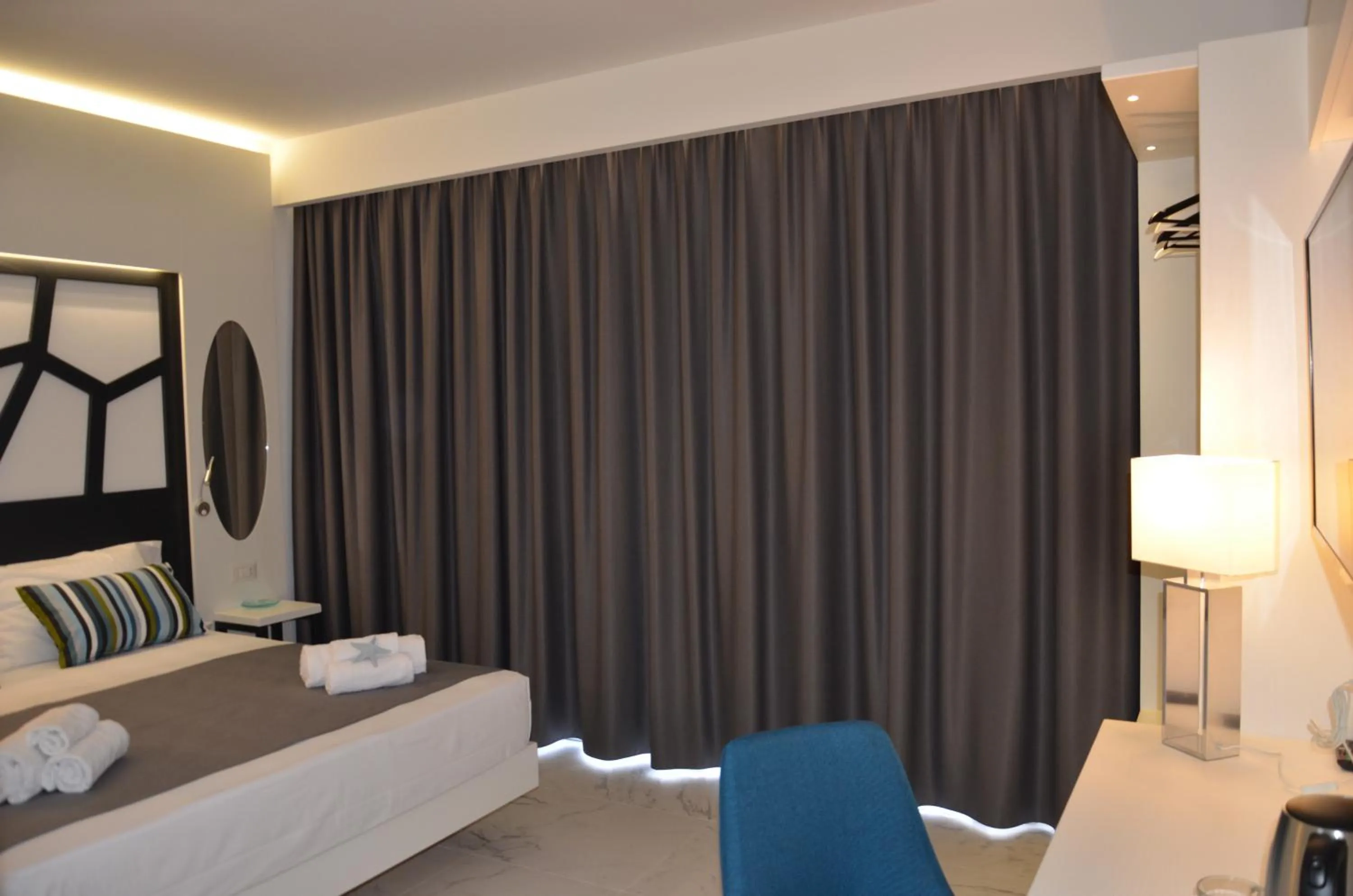 Bed in Centurio luxury rooms