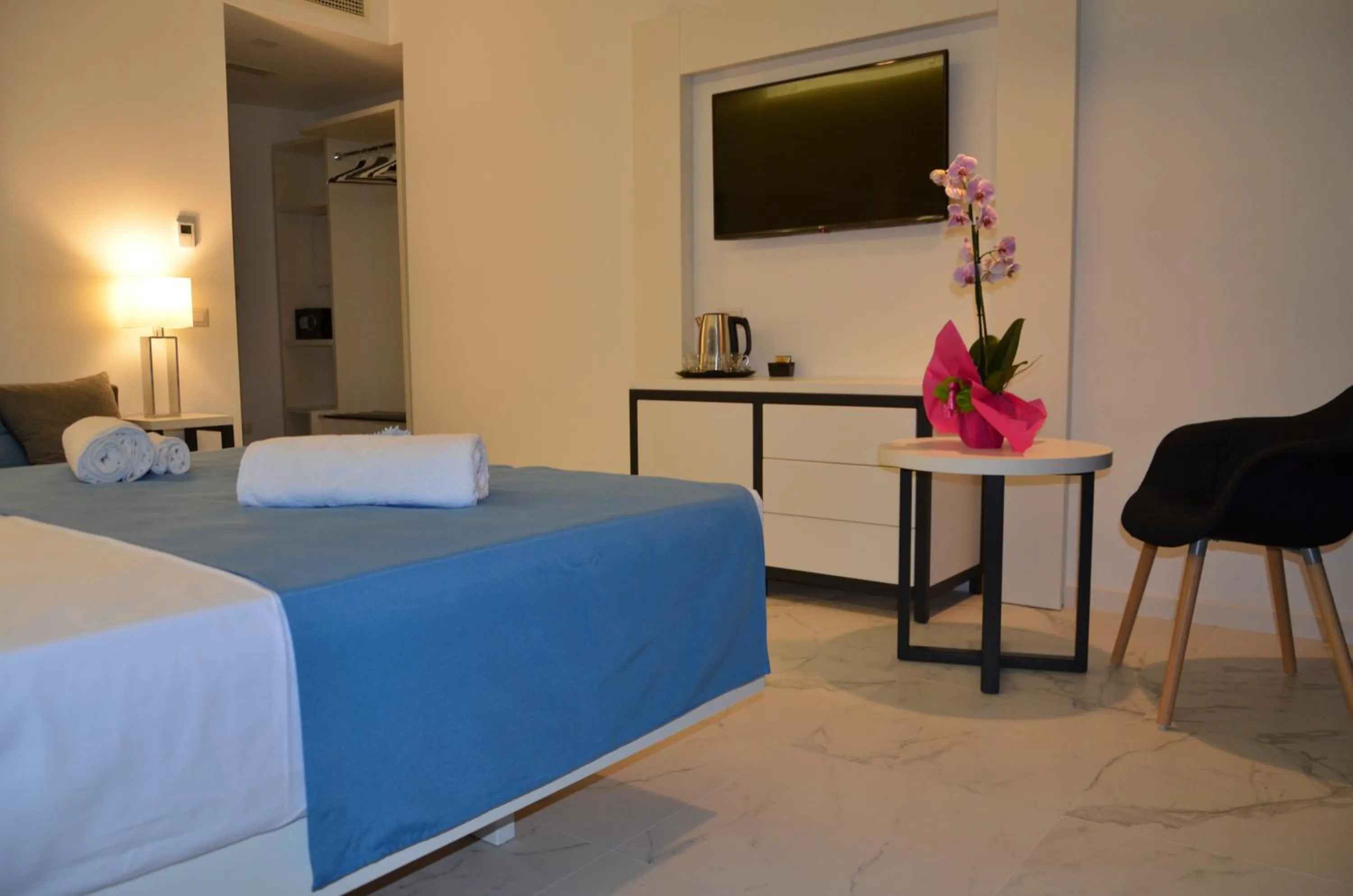 Bed in Centurio luxury rooms