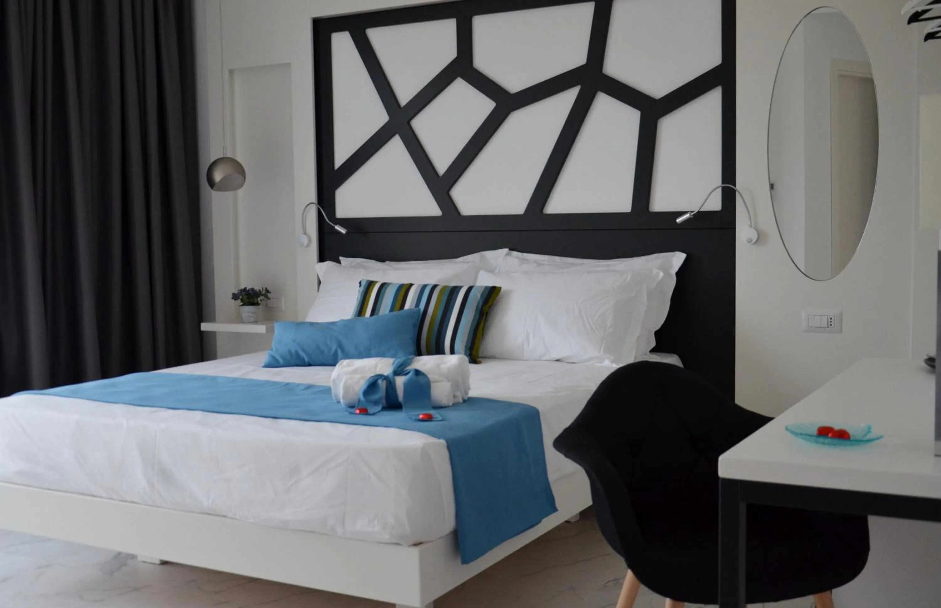 Bed in Centurio luxury rooms