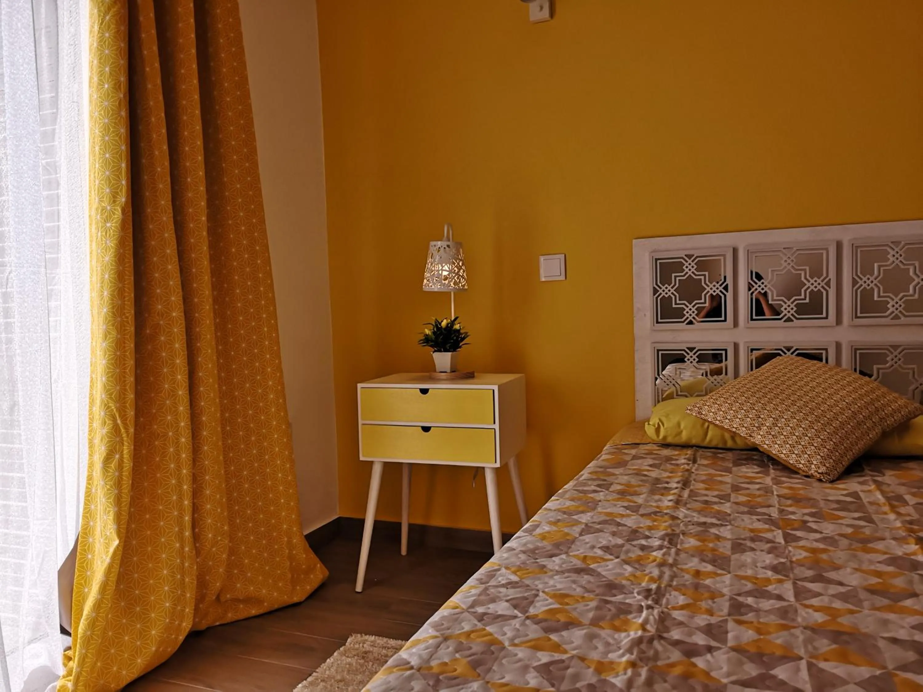 Bed in Sensations Guesthouse