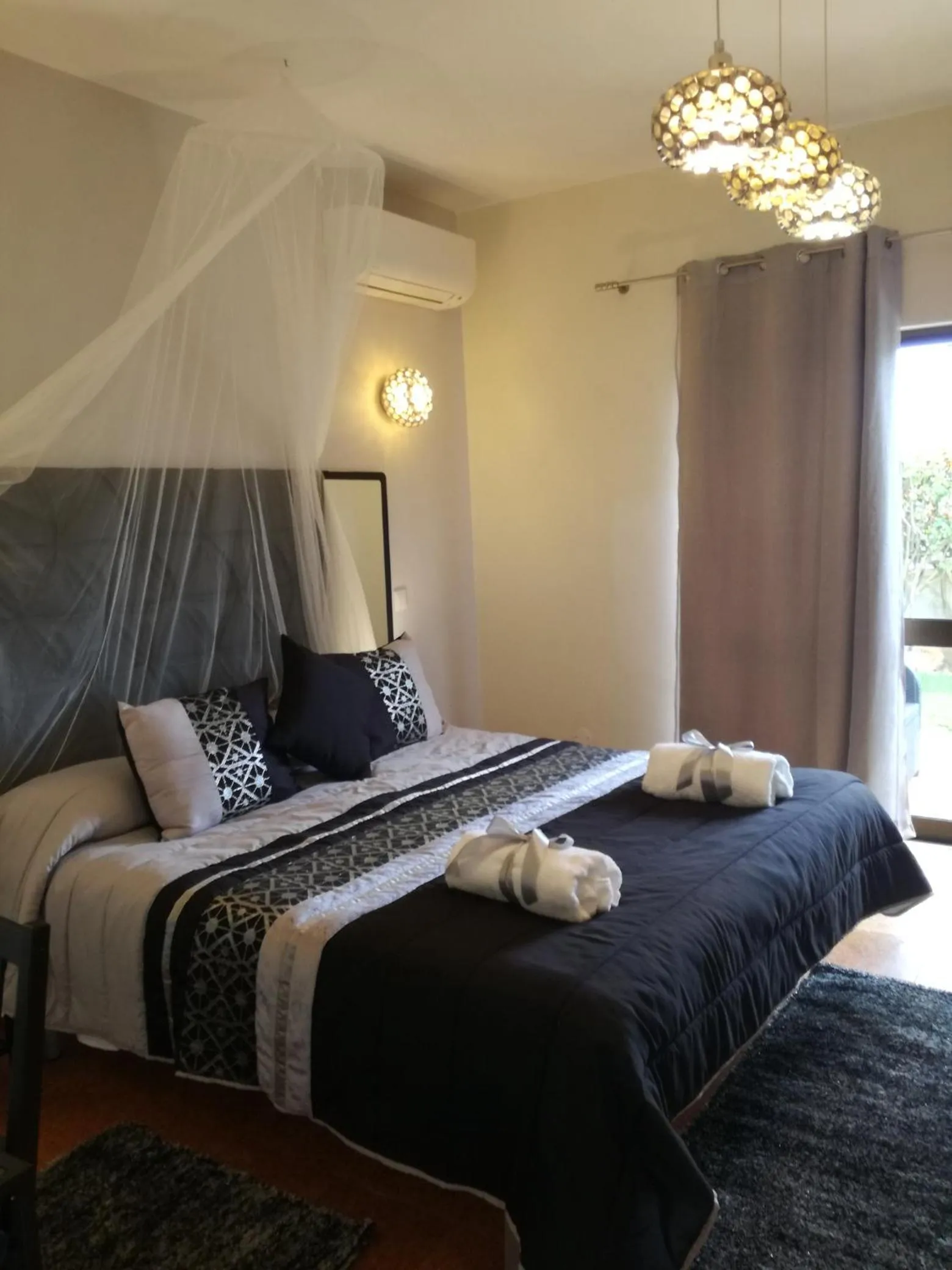 Bed in Sensations Guesthouse