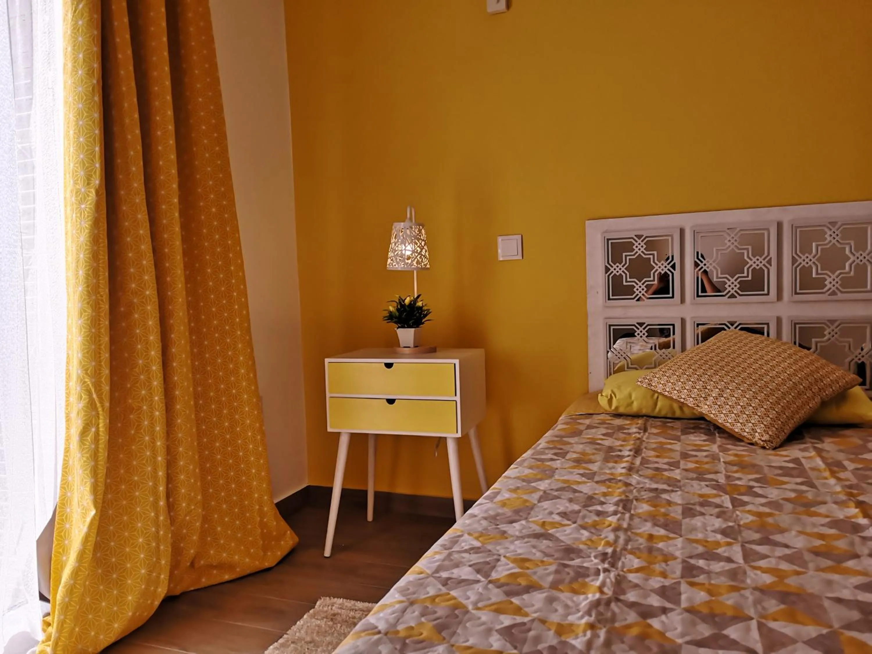 Bed in Sensations Guesthouse