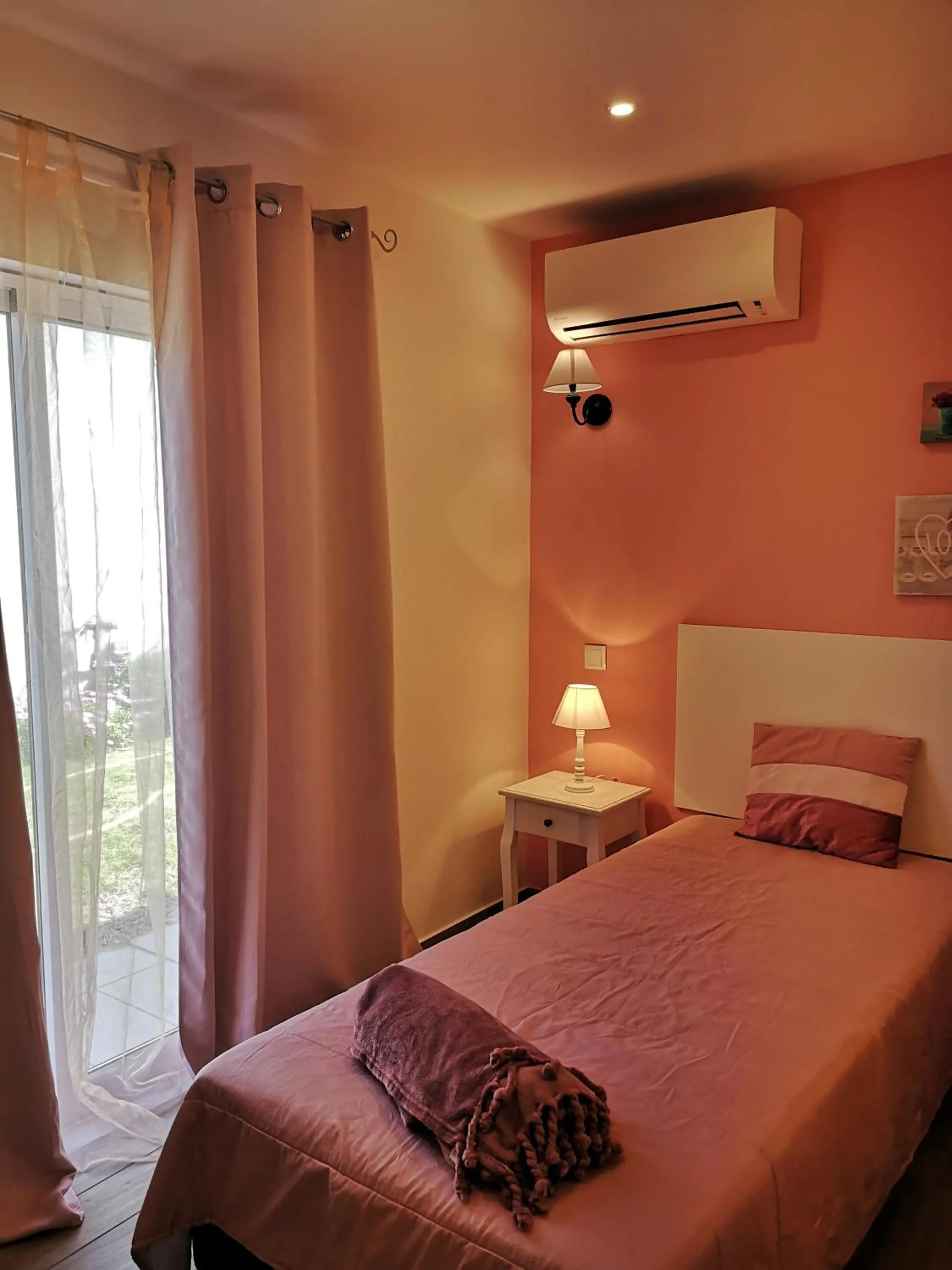 Bed in Sensations Guesthouse