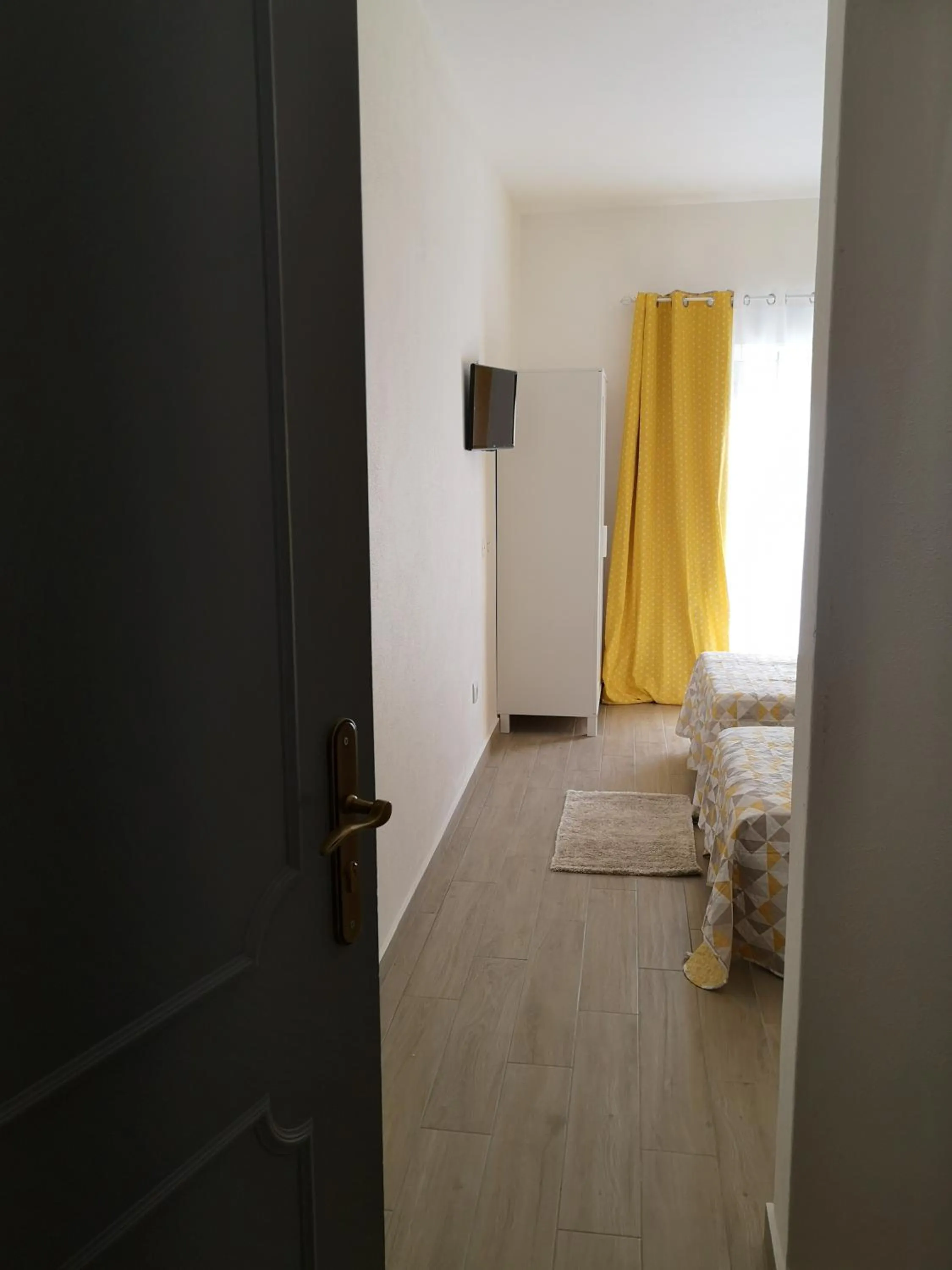 Bed in Sensations Guesthouse