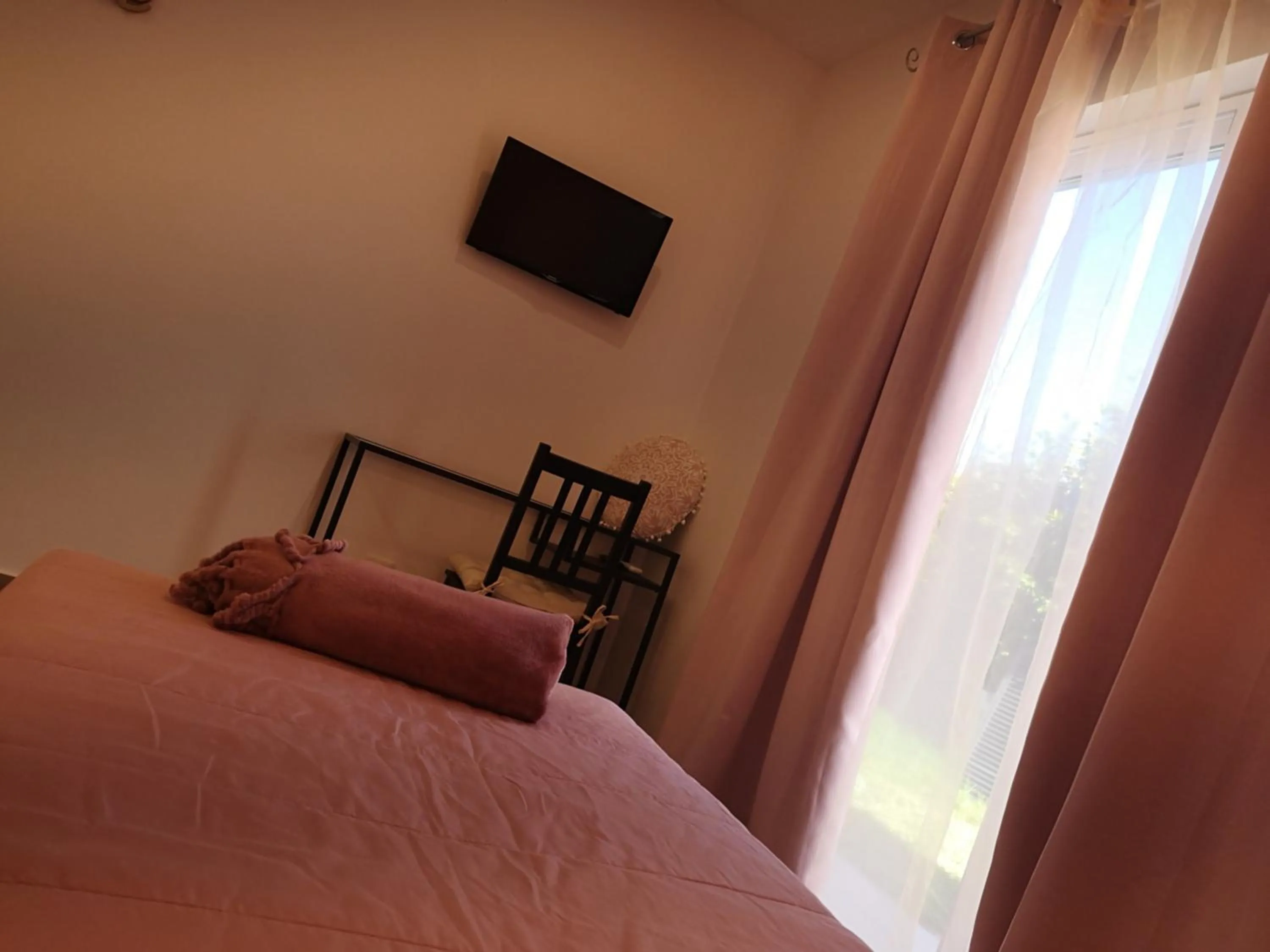 Bed in Sensations Guesthouse