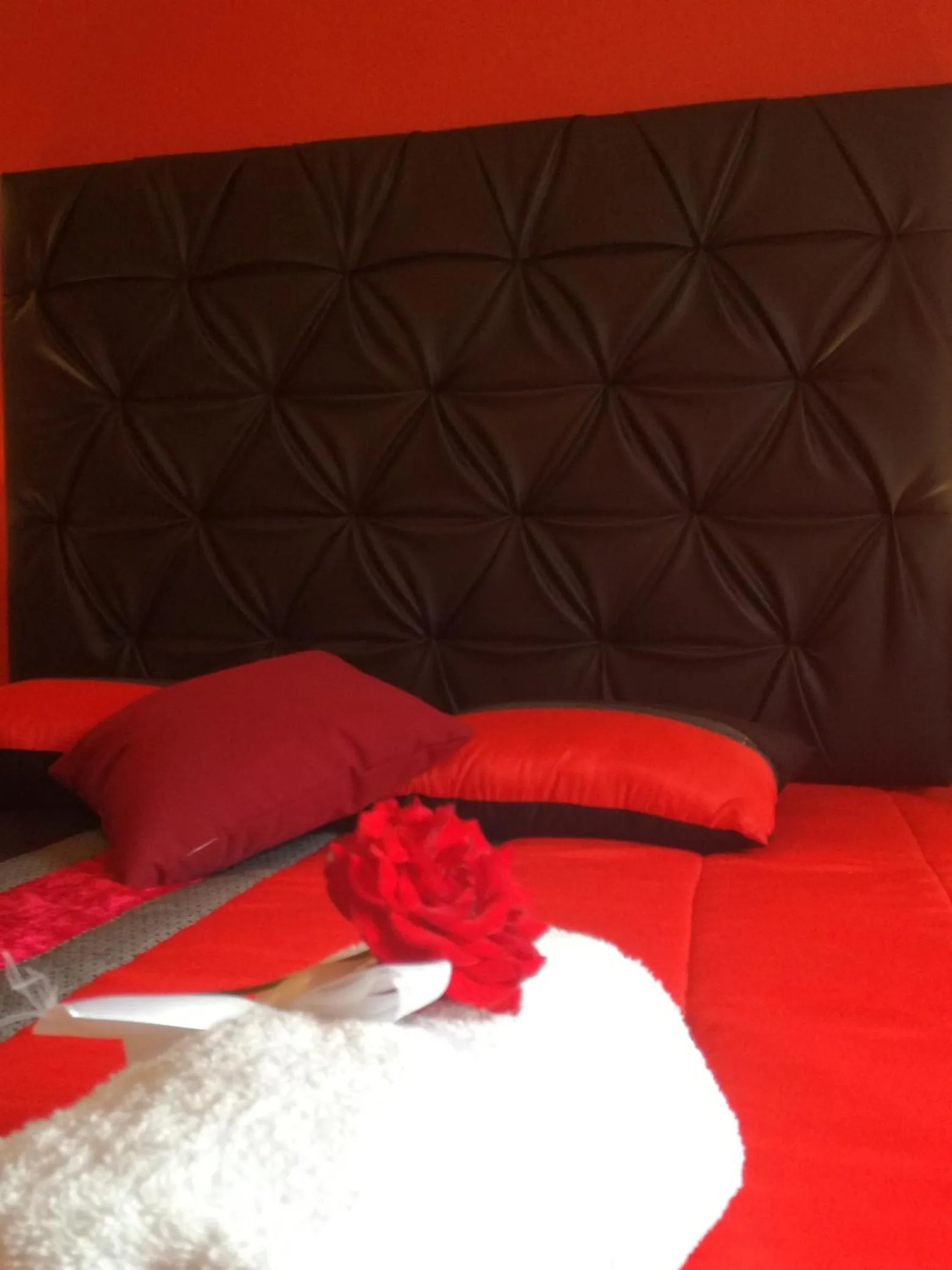 Bed in Sensations Guesthouse