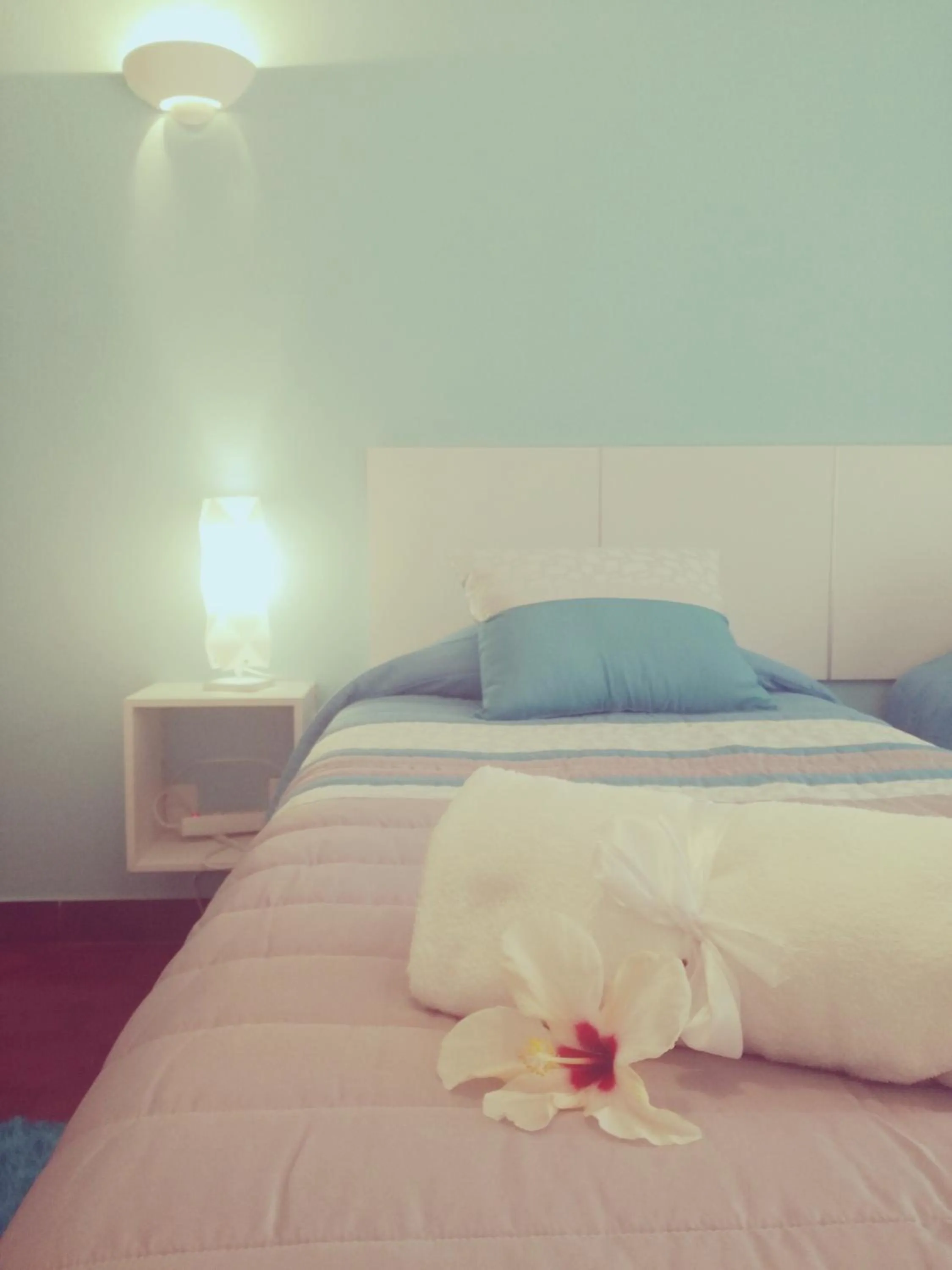 Bed in Sensations Guesthouse