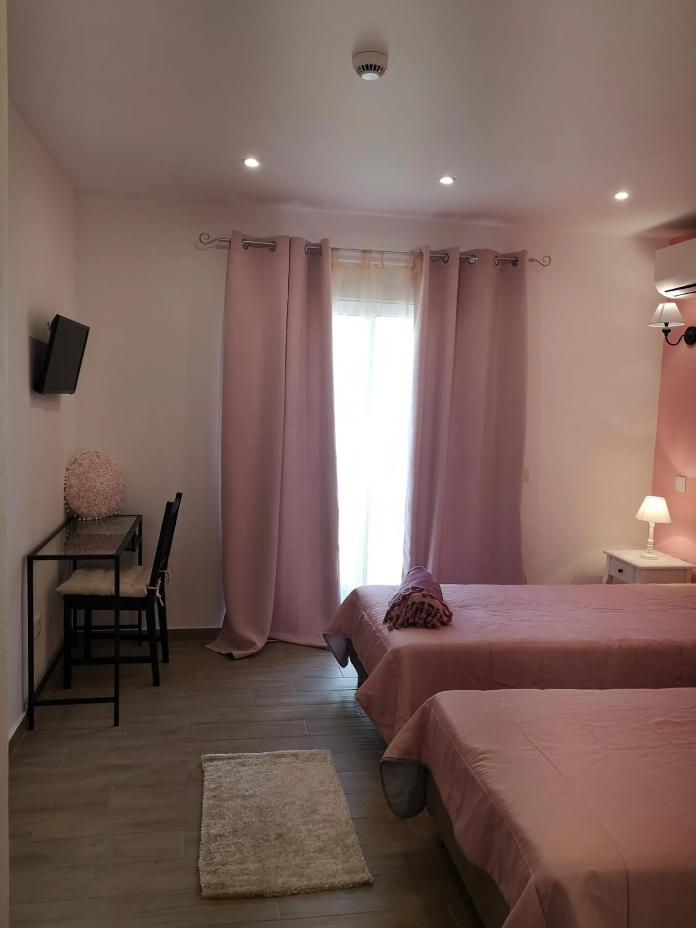 Bed in Sensations Guesthouse