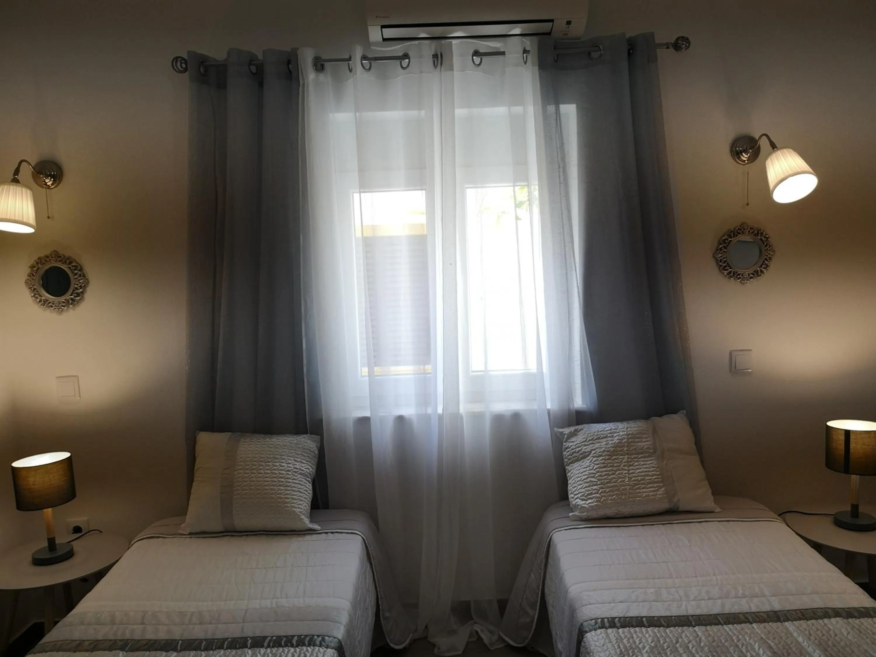 Bed in Sensations Guesthouse