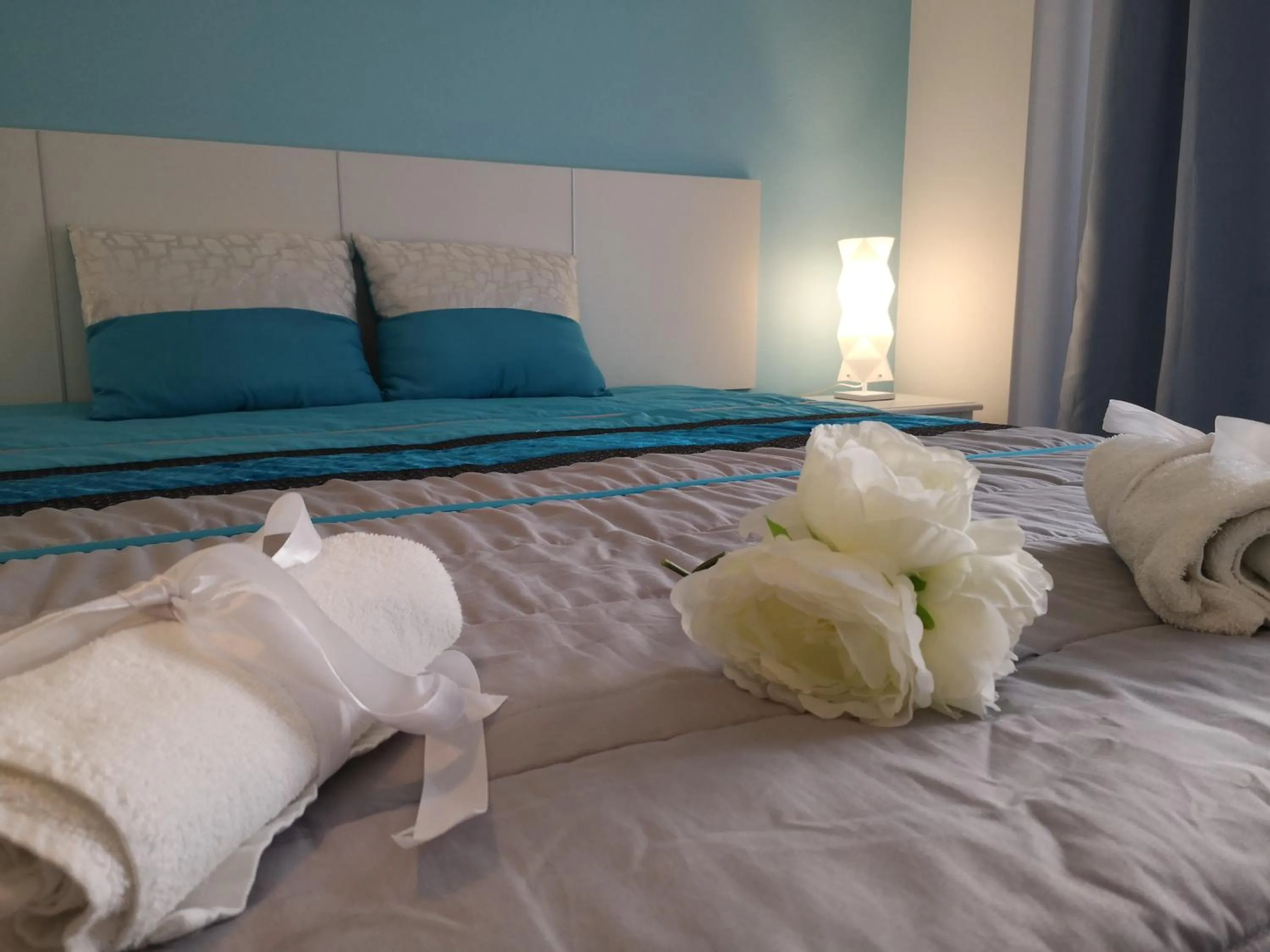 Bed in Sensations Guesthouse