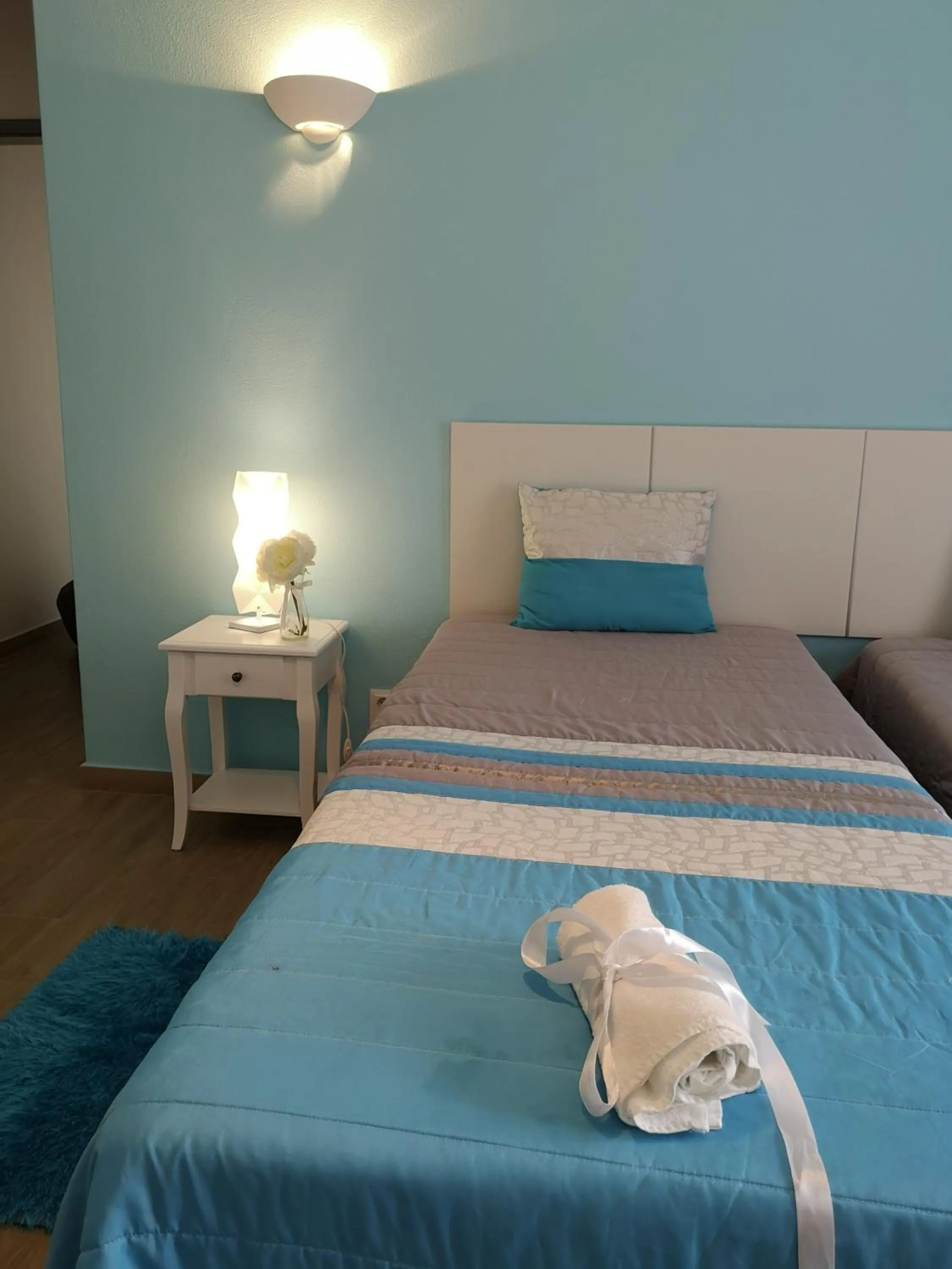 Bed in Sensations Guesthouse