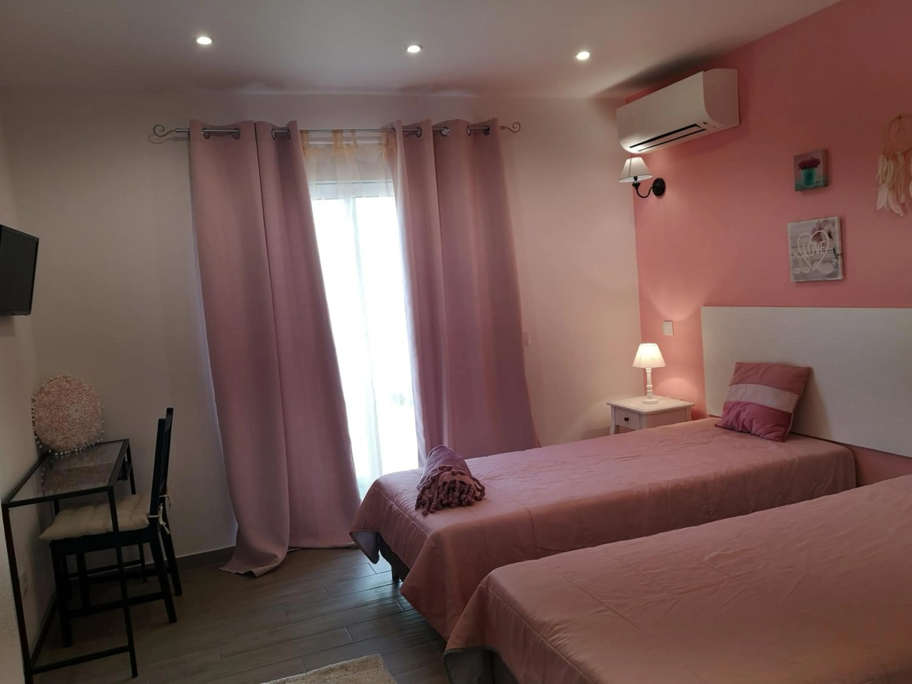 Bed in Sensations Guesthouse