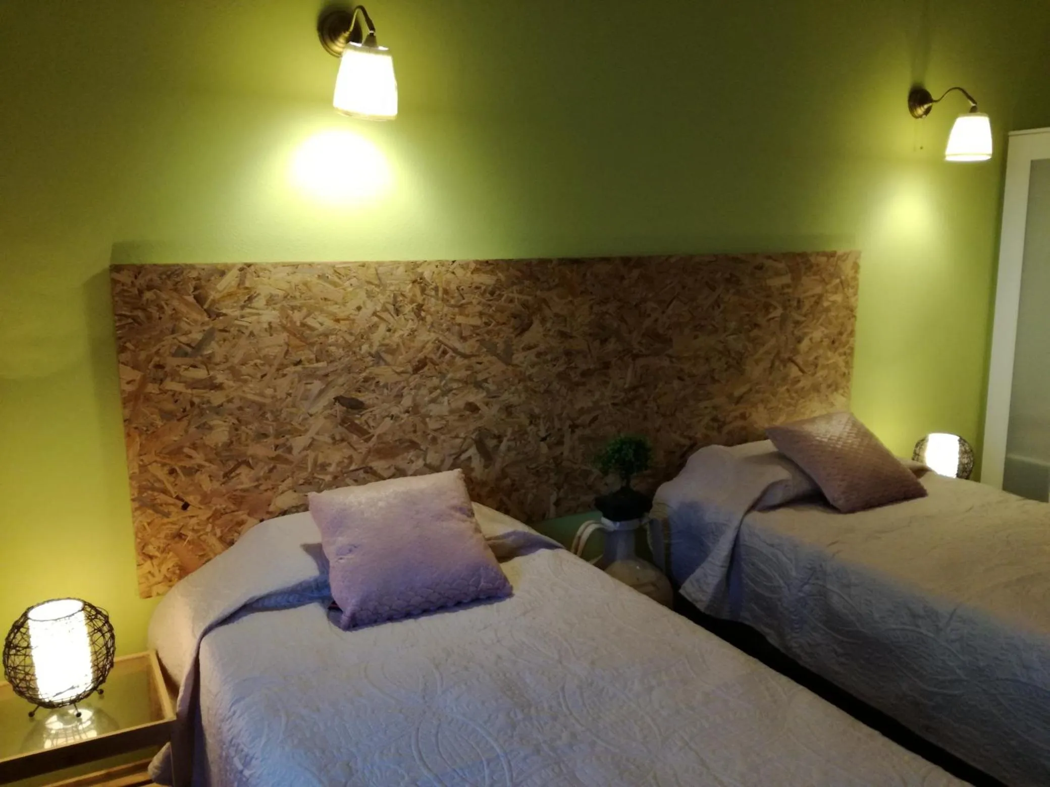 Bed in Sensations Guesthouse