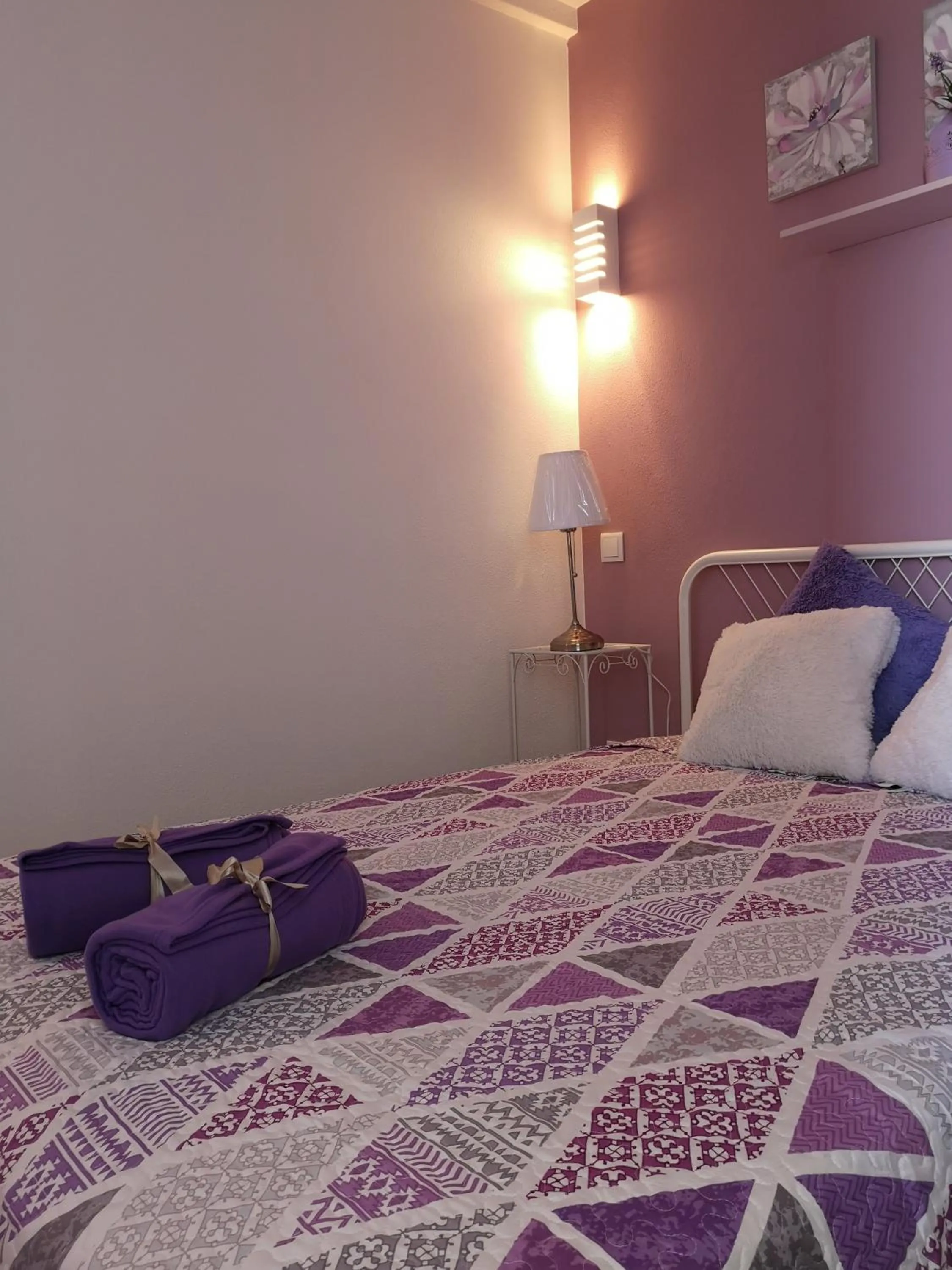 Bed in Sensations Guesthouse