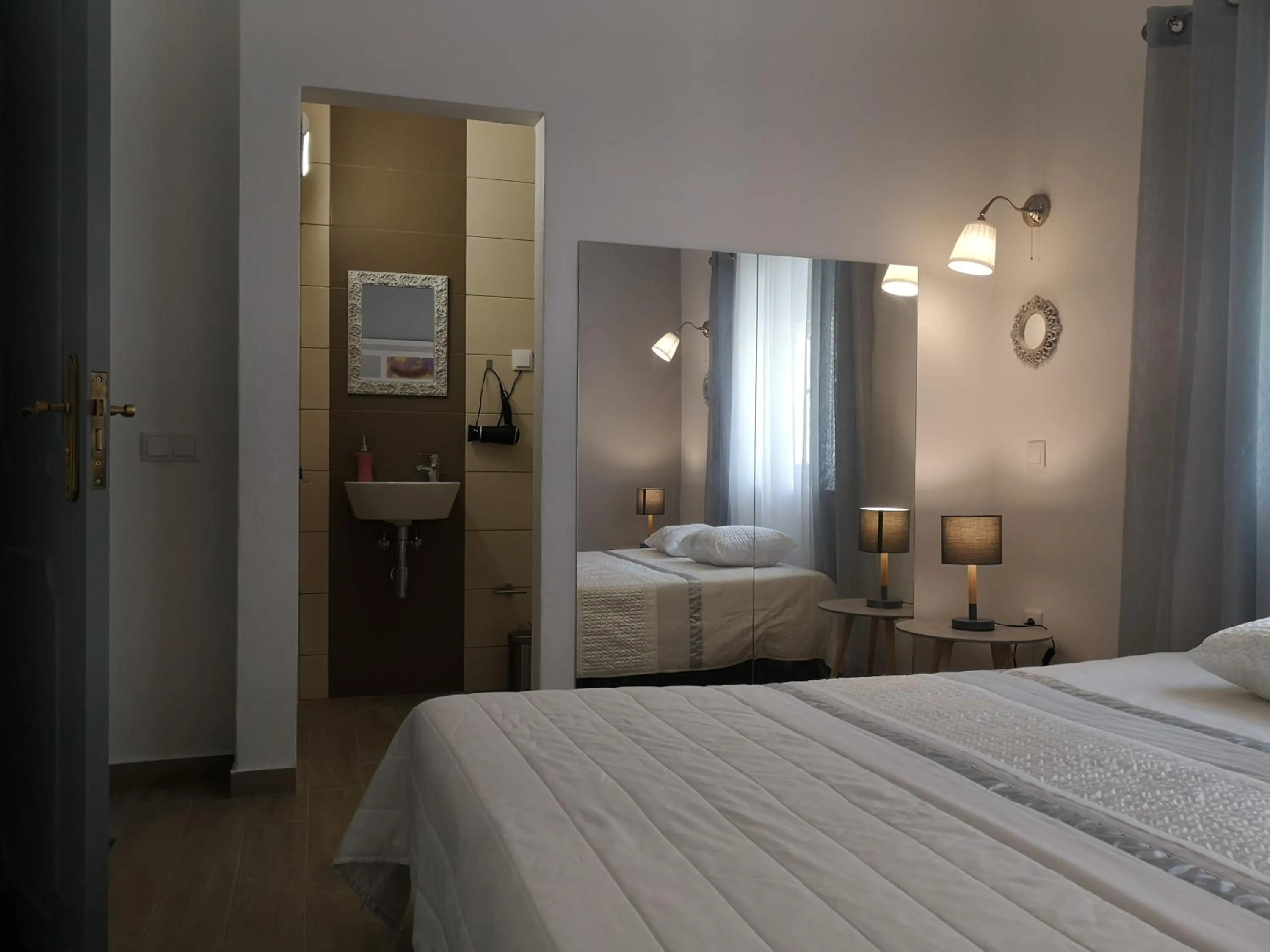 Bed in Sensations Guesthouse