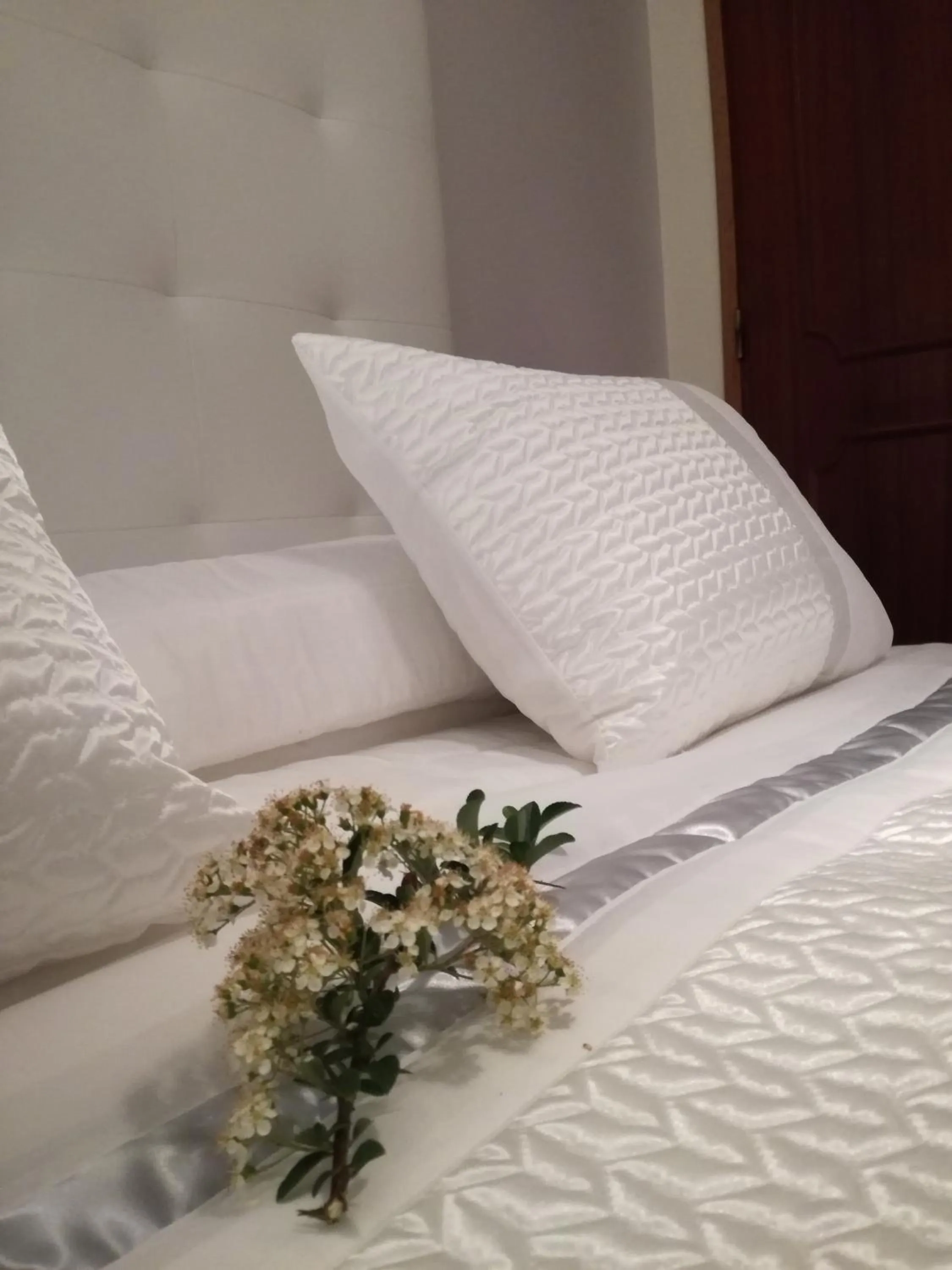 Bed in Sensations Guesthouse