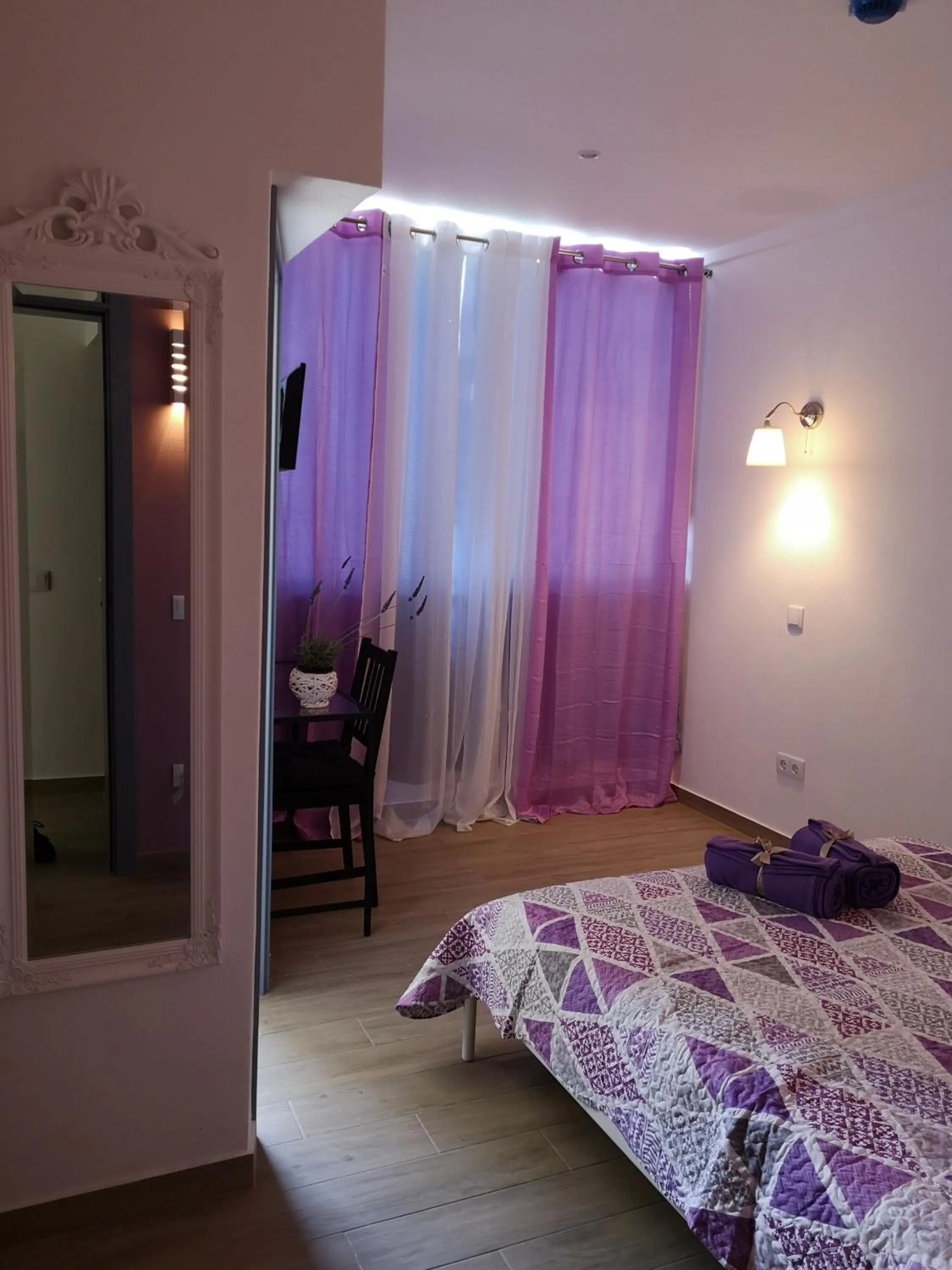 Bed in Sensations Guesthouse