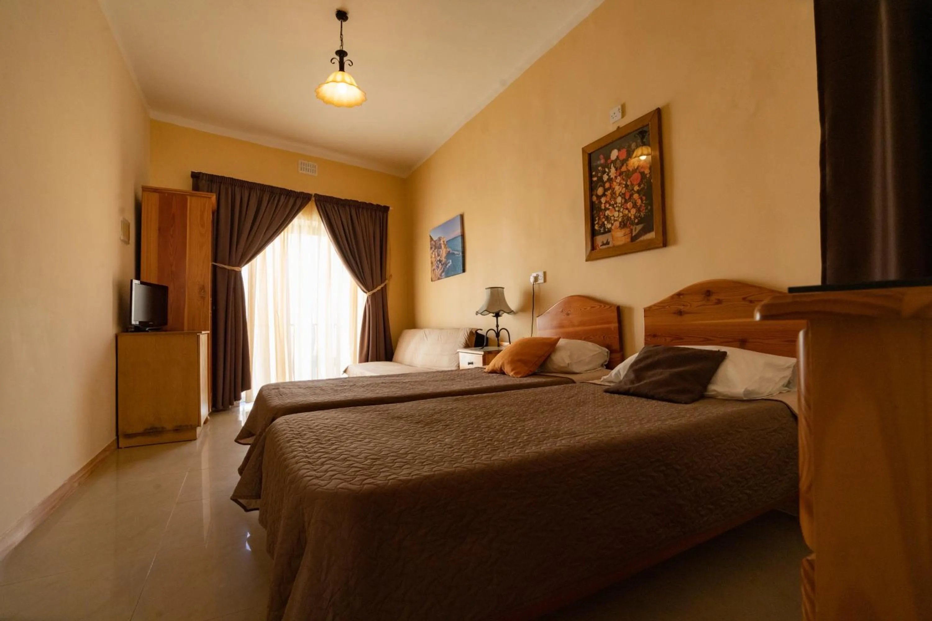 Bed in Lantern Guest House