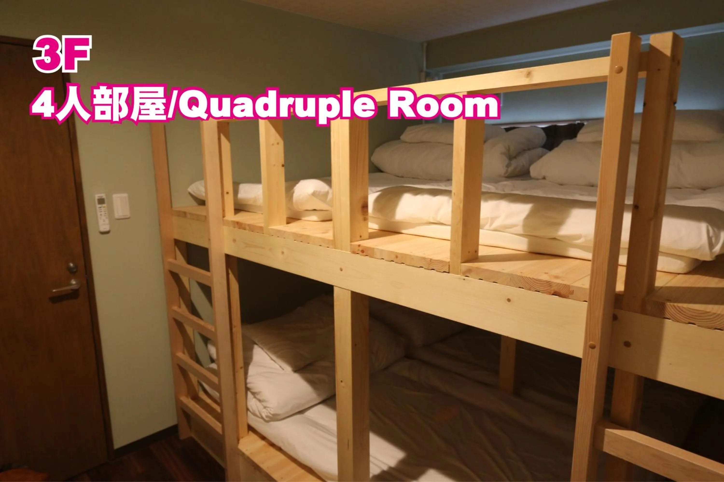 Photo of the whole room, Bed in RED HELMET House & Sports Bar Hiroshima