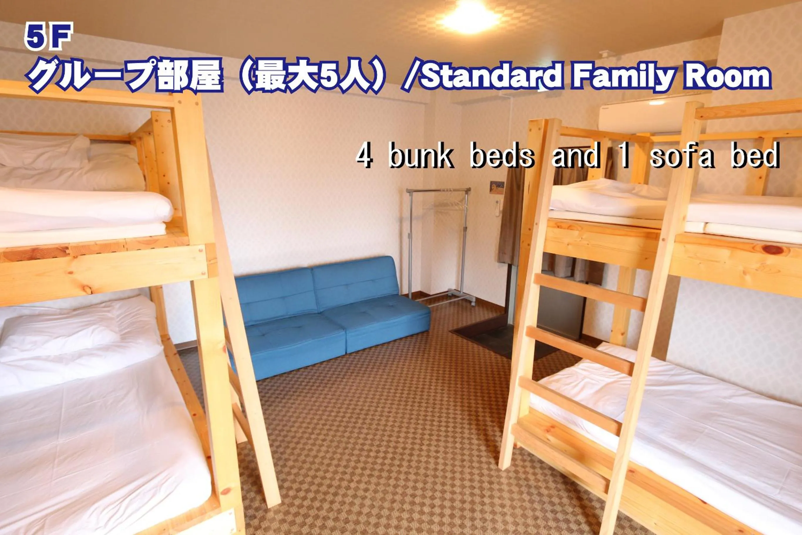 Photo of the whole room, Bed in RED HELMET House & Sports Bar Hiroshima