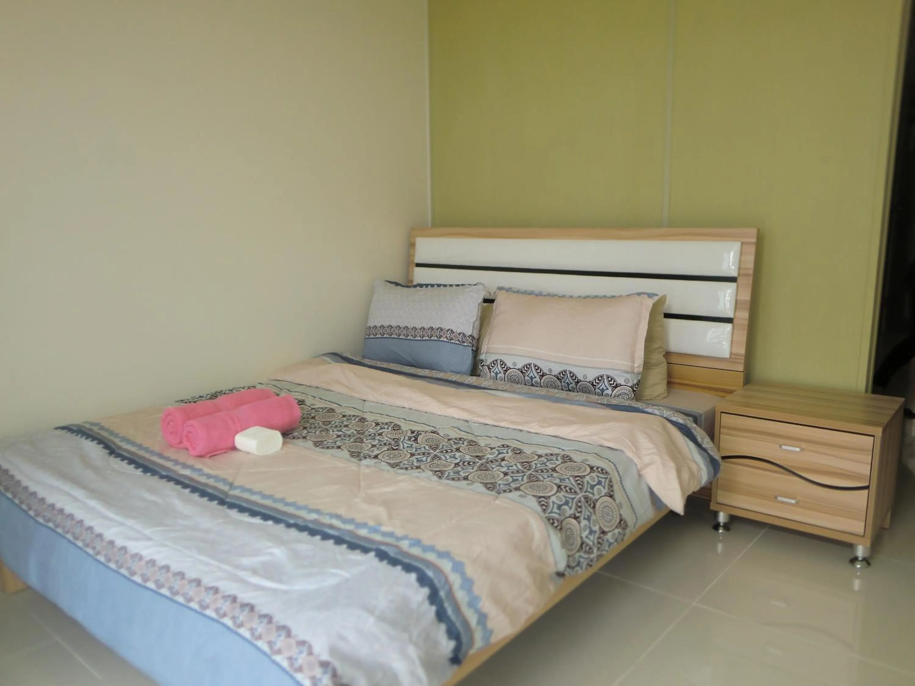 Bed in Wind Residences by SMCo