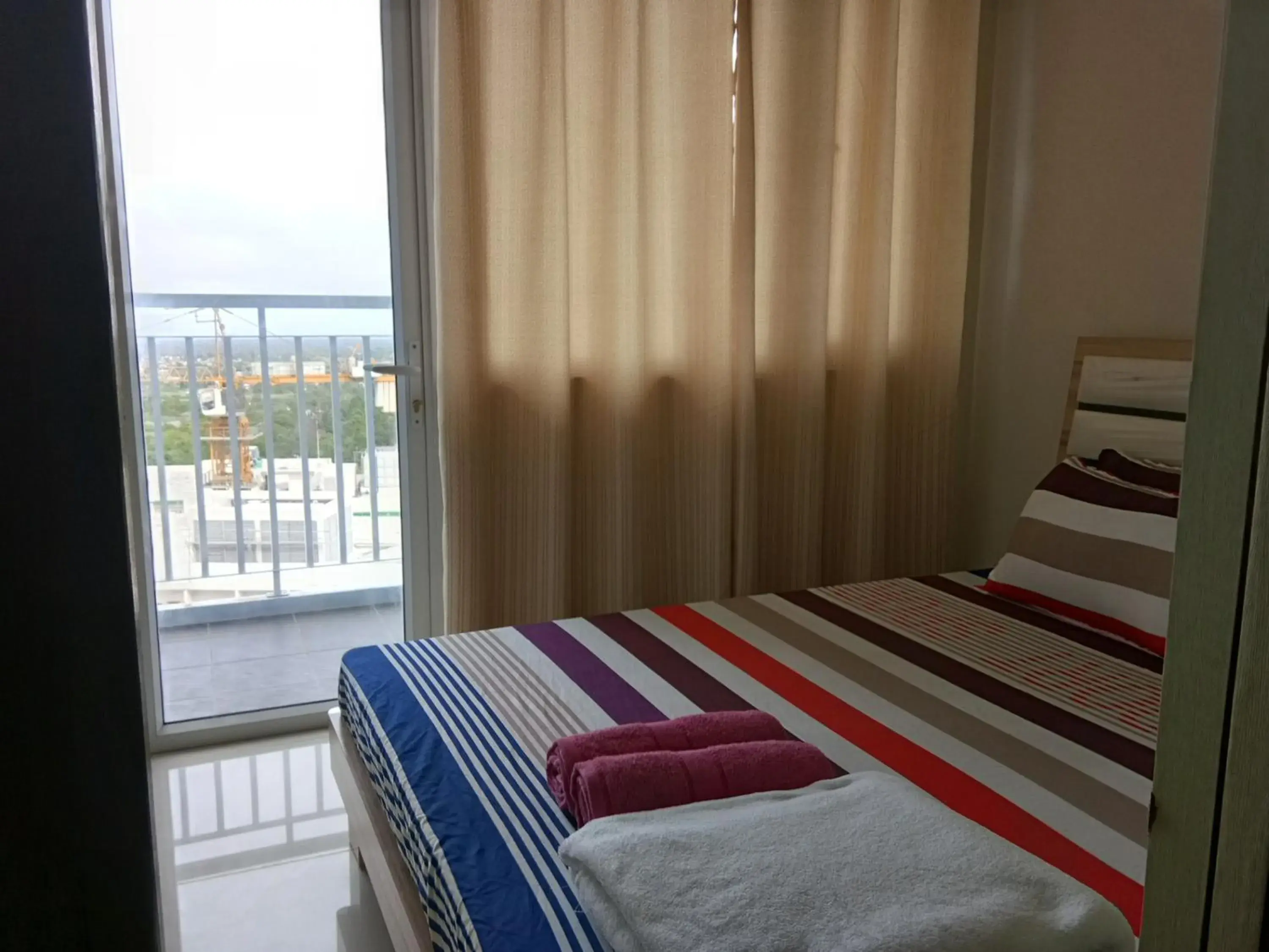 Bed in Wind Residences by SMCo Bed in Wind Residences by SMCo