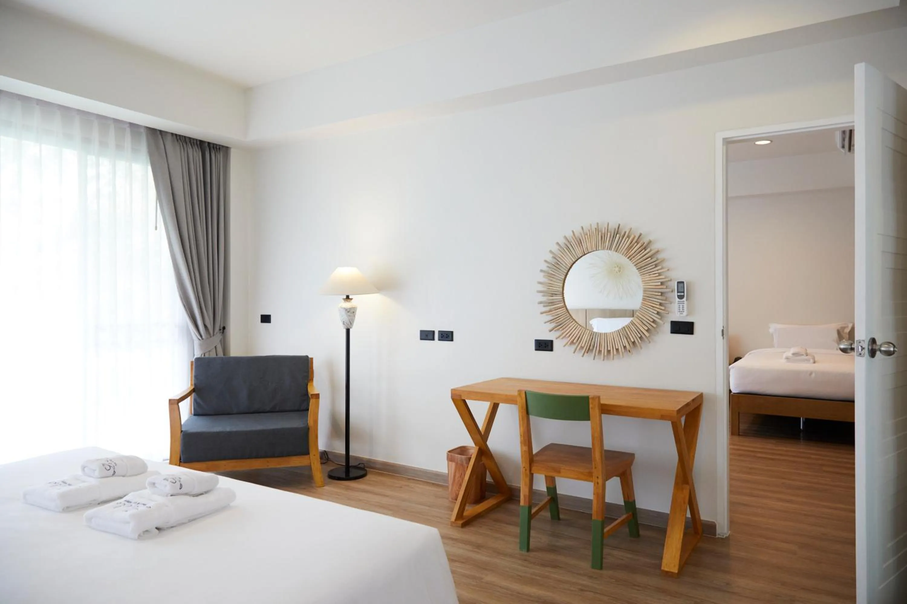 Photo of the whole room, Bed in The Leela Resort & Spa Pattaya