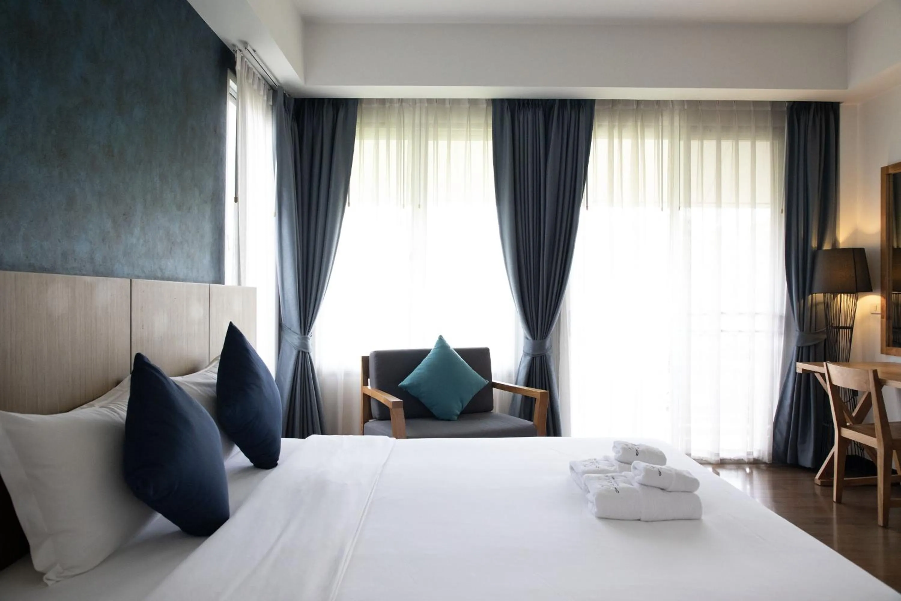 Bed in The Leela Resort & Spa Pattaya