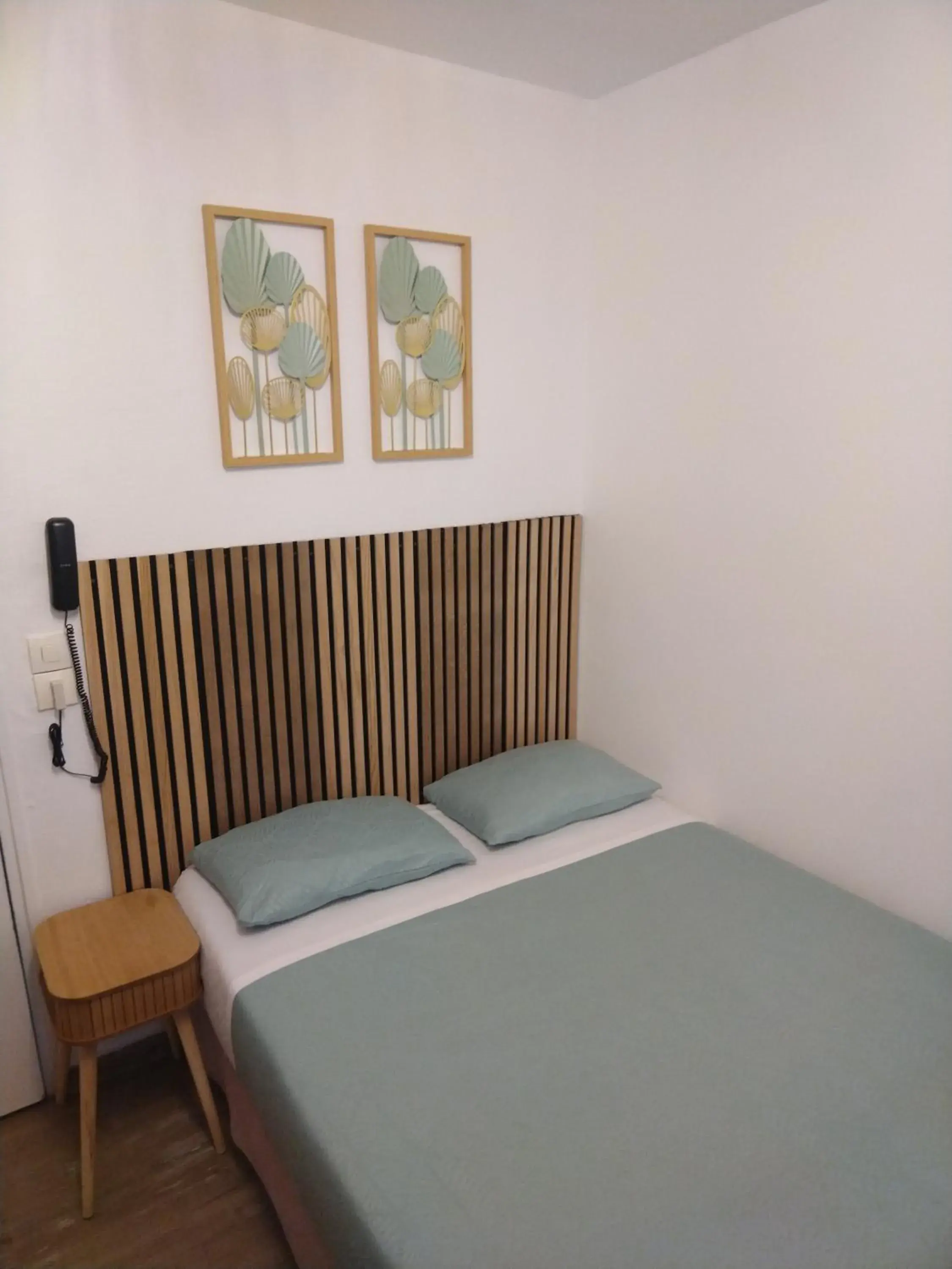 Bed in Hôtel de l'Europe Bed in Hôtel de l'Europe