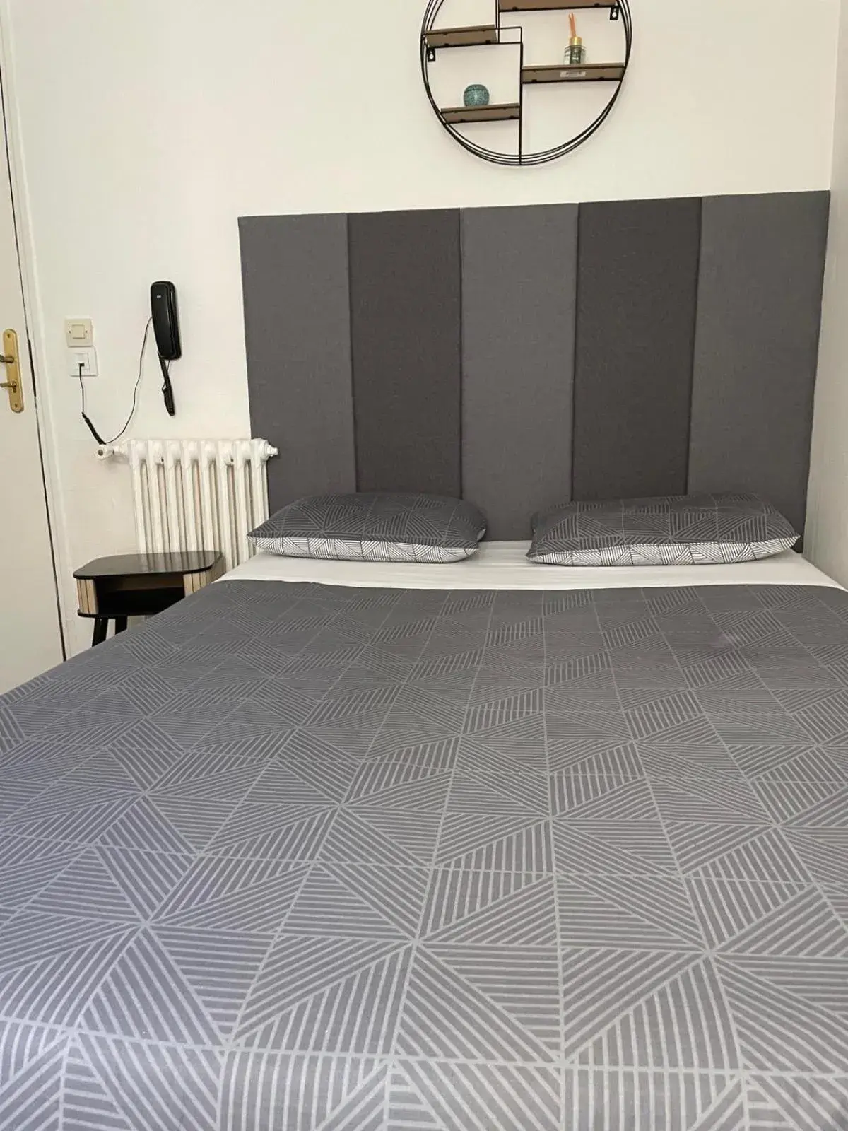 Bed in Hôtel de l'Europe Bed in Hôtel de l'Europe