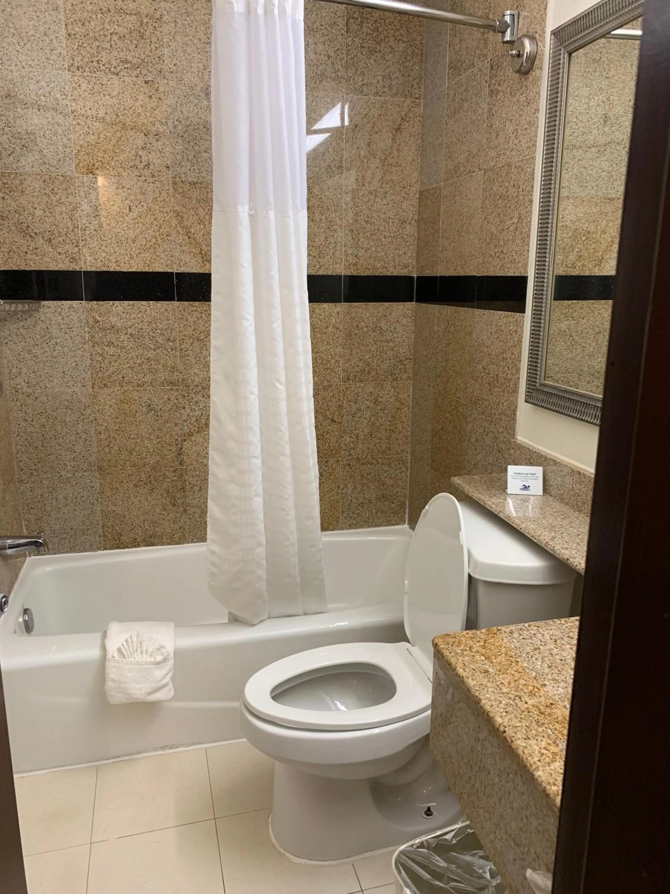 Toilet in Super 8 by Wyndham Beaumont I-10 College St