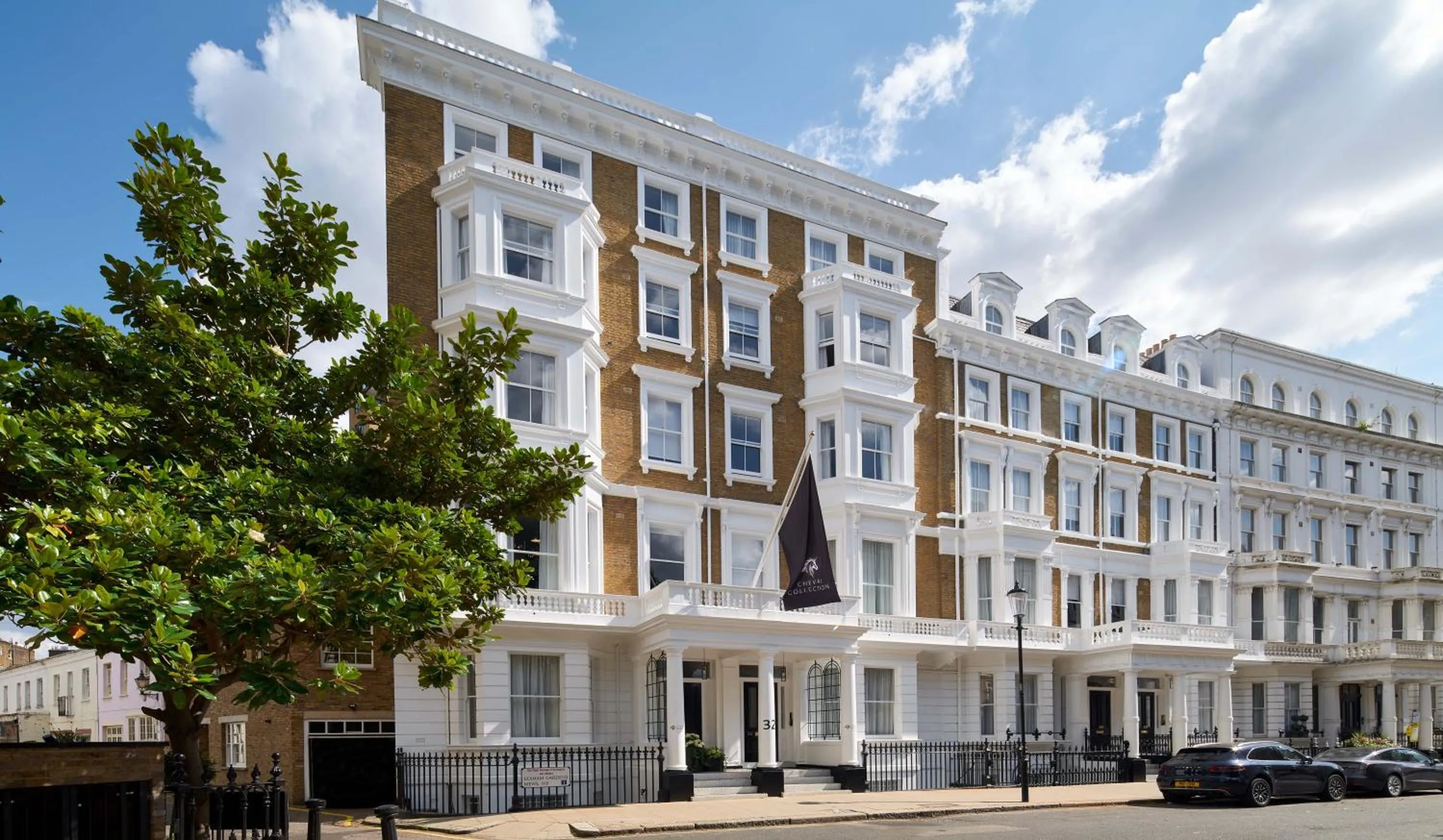 Facade/entrance in Lexham Gardens by Cheval Maison
