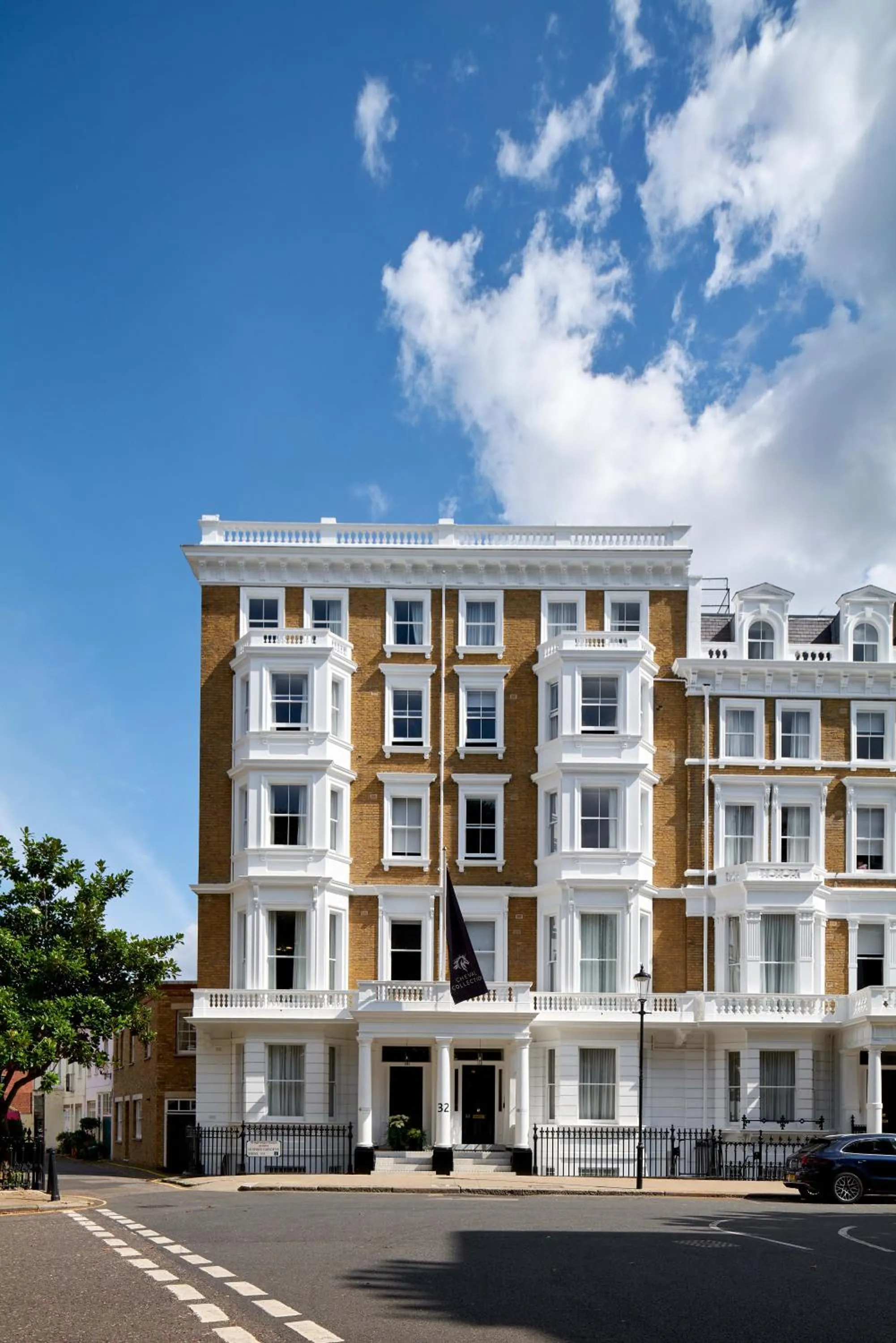 Facade/entrance in Lexham Gardens by Cheval Maison