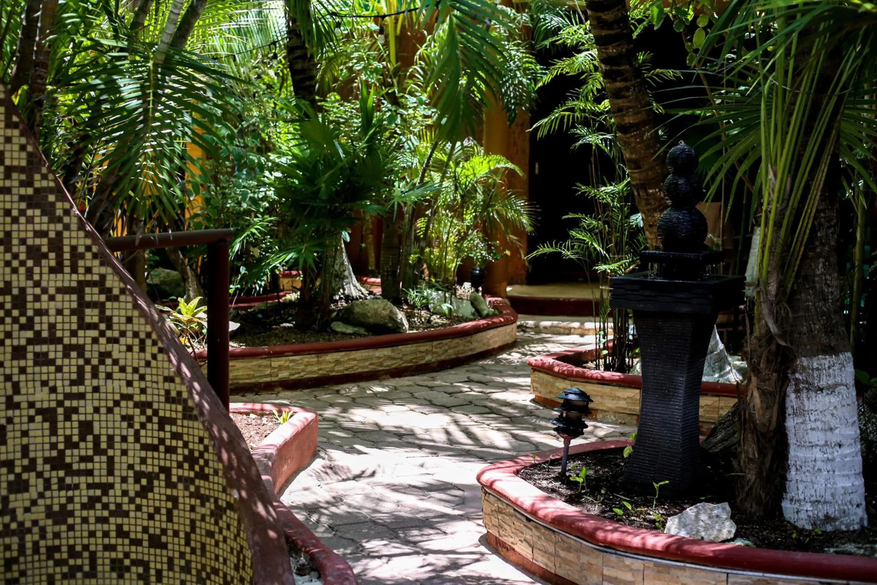 Patio in Cocos Cabañas Playa del Carmen Adults Only